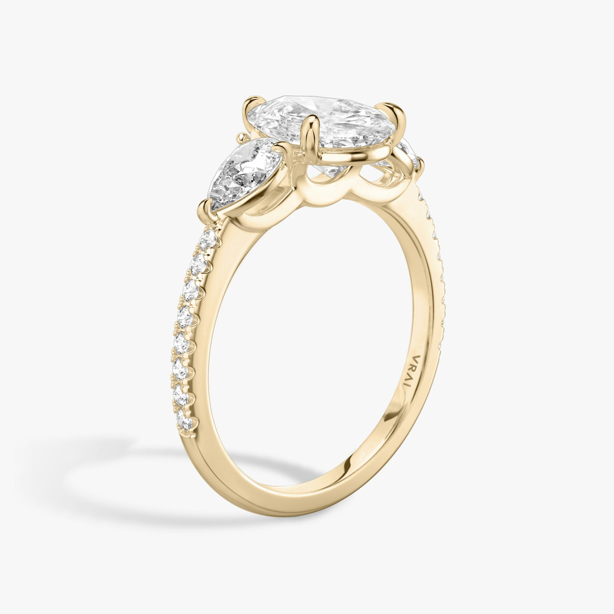 The Three Stone | Pear | 14k | Rose Gold | bandAccent: Pavé | sideStoneCarat: 0.25ct | sideStoneShape: Pear | diamondOrientation: vertical | caratWeight: other