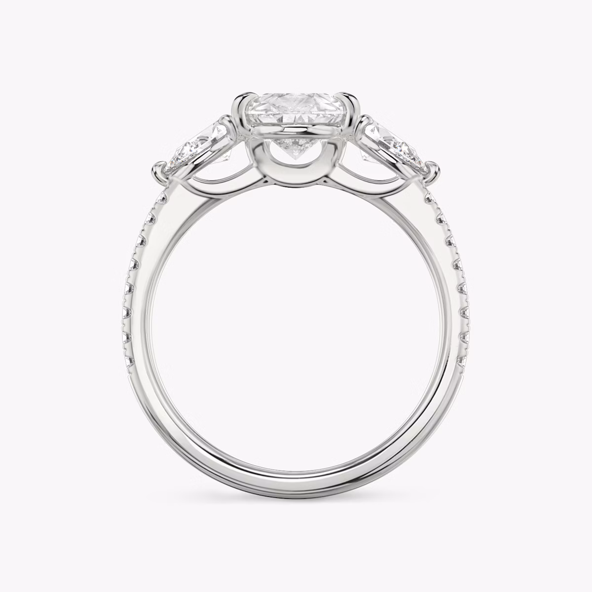 The Three Stone | Pear | 18k | White Gold | bandAccent: Pavé | sideStoneCarat: 0.25ct | sideStoneShape: Pear | diamondOrientation: vertical | caratWeight: other
