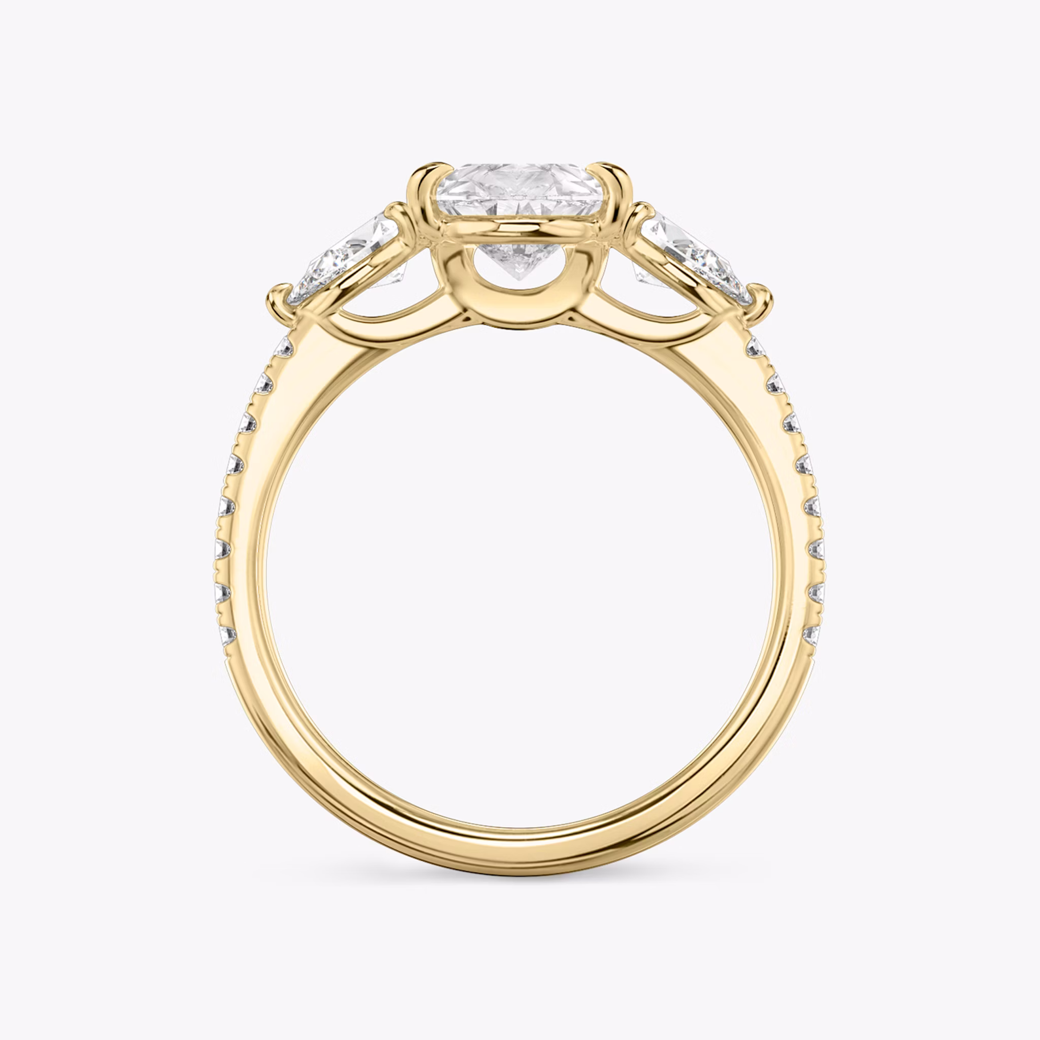 The Three Stone | Pear | 18k | Yellow Gold | bandAccent: Pavé | sideStoneCarat: 0.25ct | sideStoneShape: Pear | diamondOrientation: vertical | caratWeight: other