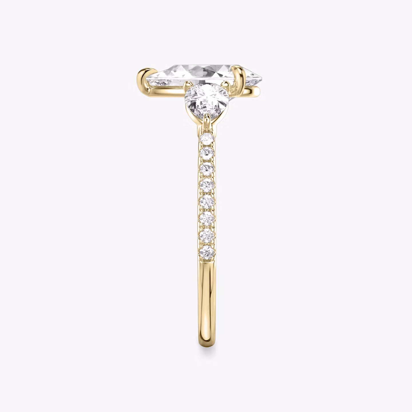 The Three Stone | Pear | 18k | Yellow Gold | bandAccent: Pavé | sideStoneCarat: 0.25ct | sideStoneShape: Pear | diamondOrientation: vertical | caratWeight: other