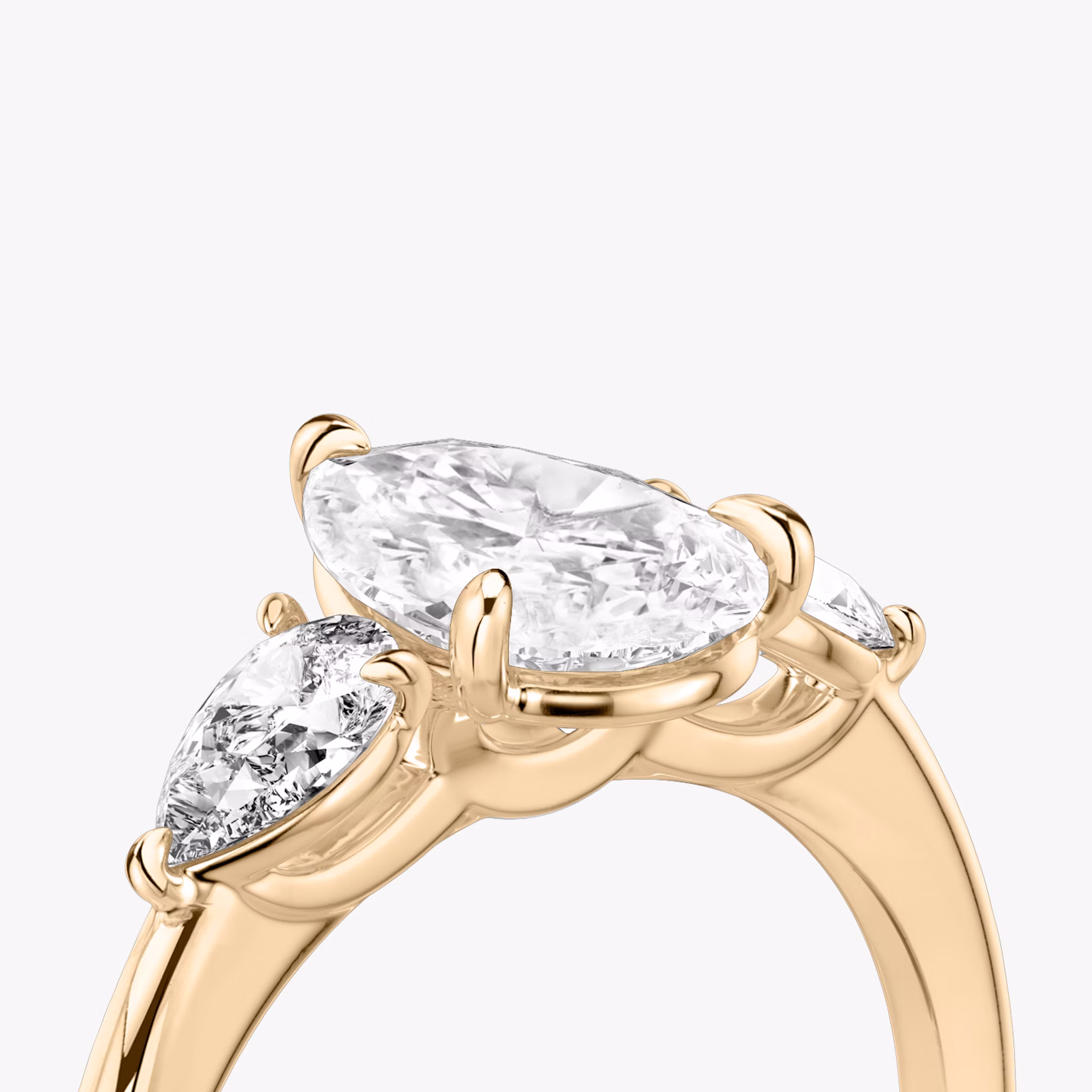 The Three Stone | Pear | 14k | Rose Gold | bandAccent: Plain | sideStoneCarat: 0.25ct | sideStoneShape: Pear | diamondOrientation: vertical | caratWeight: other