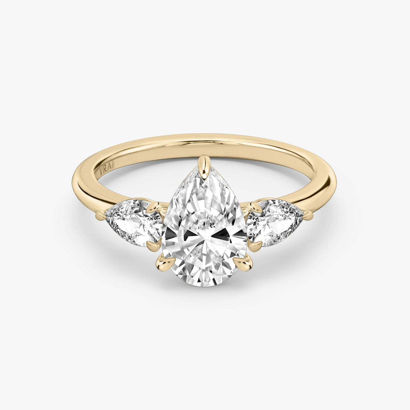 The Three Stone | Pear | 14k | Rose Gold | bandAccent: Plain | sideStoneCarat: 0.25ct | sideStoneShape: Pear | diamondOrientation: vertical | caratWeight: other