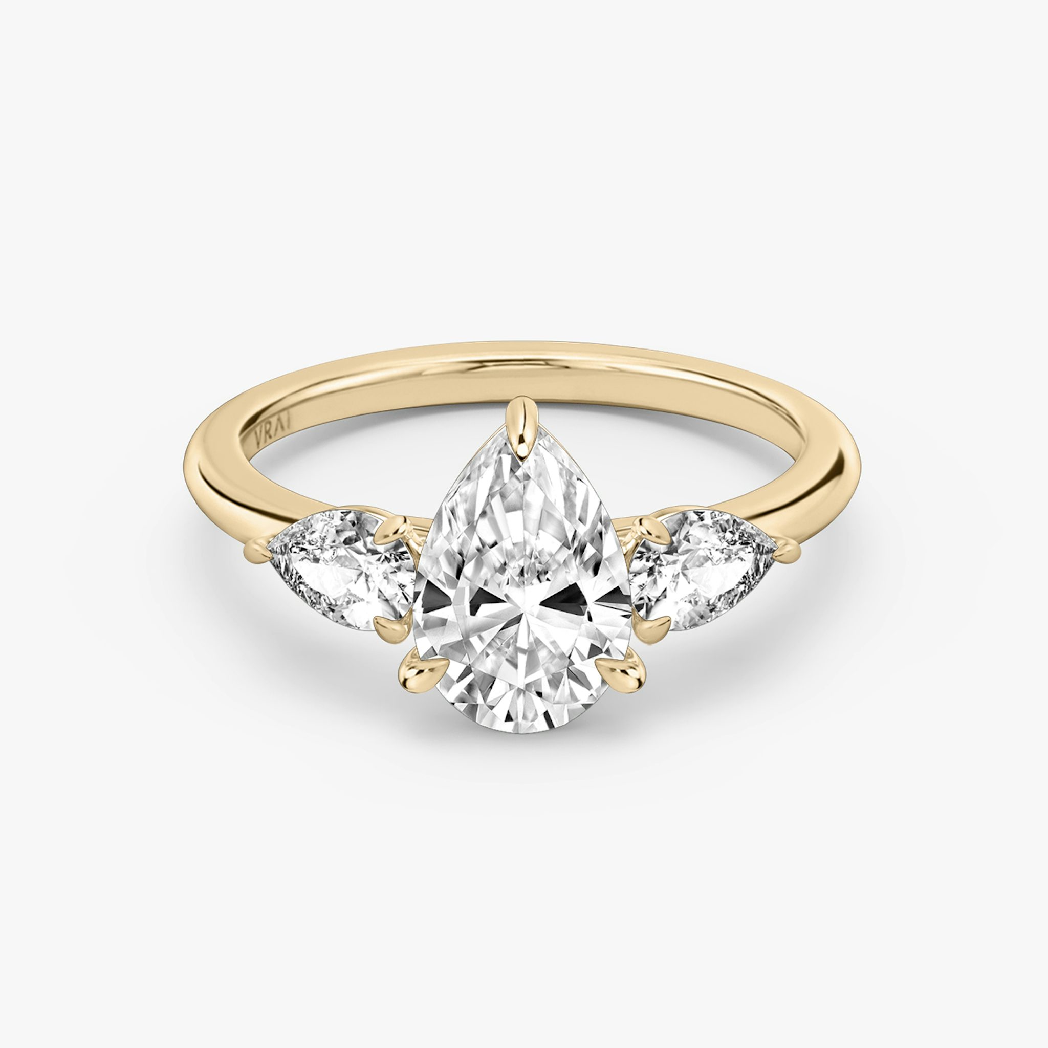 The Three Stone | Pear | 14k | Rose Gold | bandAccent: Plain | sideStoneCarat: 0.25ct | sideStoneShape: Pear | diamondOrientation: vertical | caratWeight: other