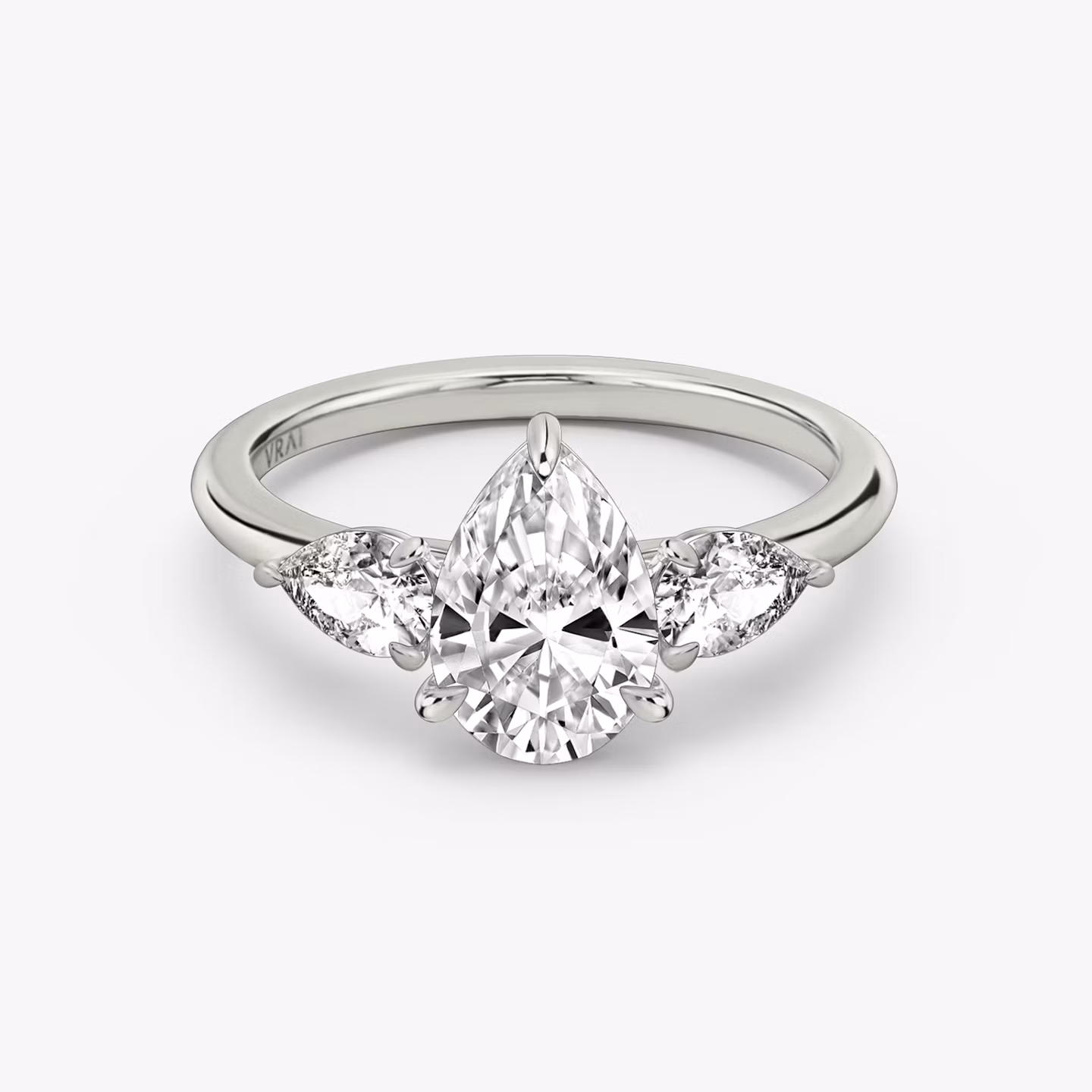 The Three Stone Pear | Platinum