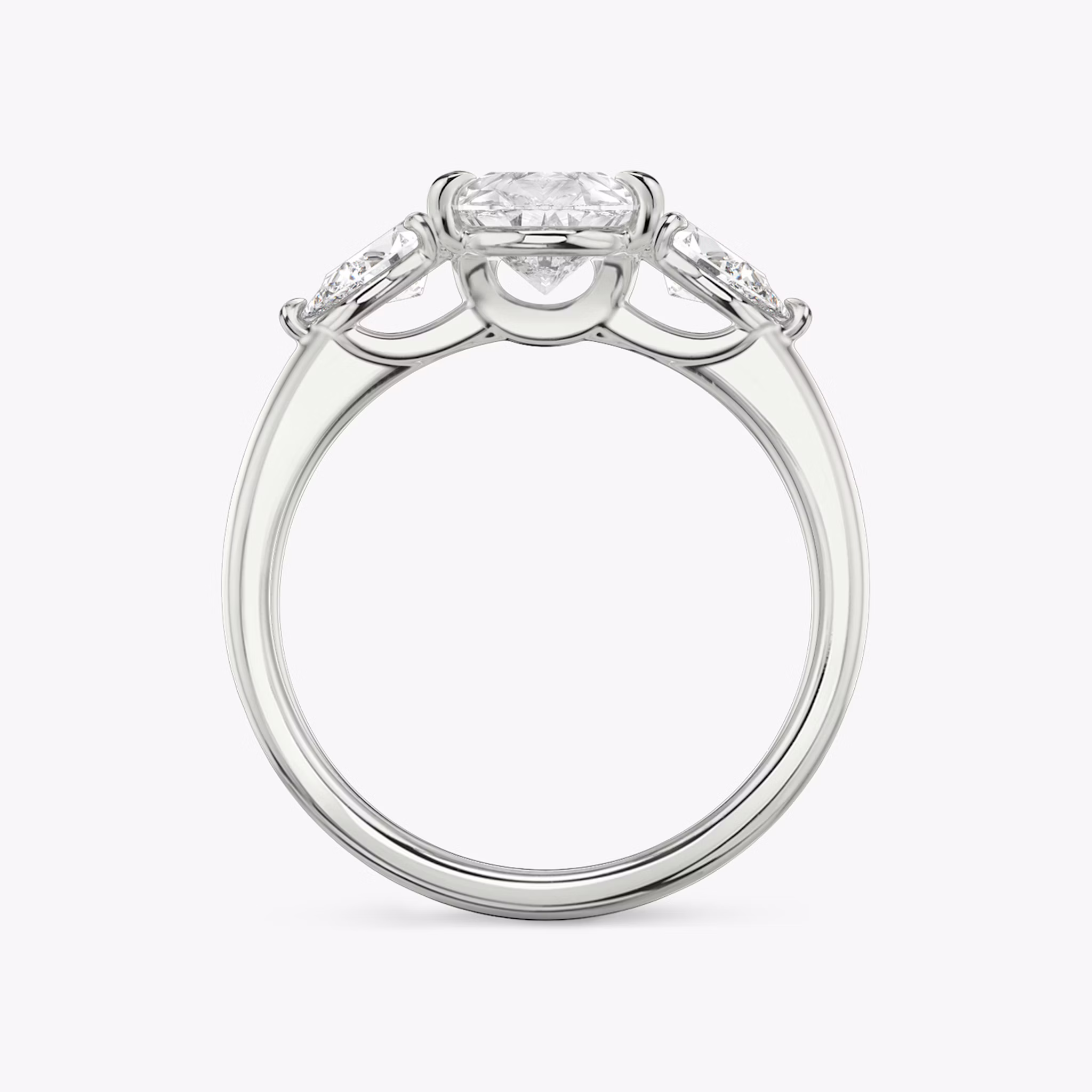 The Three Stone | Pear | Platinum | bandAccent: Plain | sideStoneCarat: 0.25ct | sideStoneShape: Pear | diamondOrientation: vertical | caratWeight: other