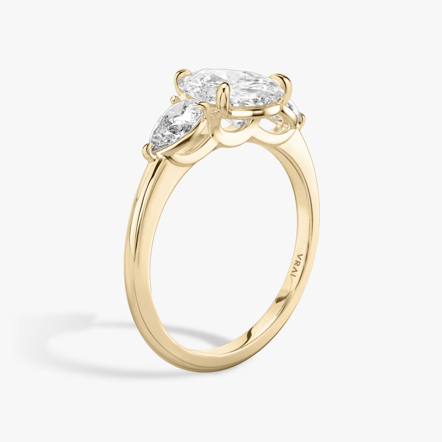 The Three Stone | Pear | 14k | Rose Gold | bandAccent: Plain | sideStoneCarat: 0.25ct | sideStoneShape: Pear | diamondOrientation: vertical | caratWeight: other