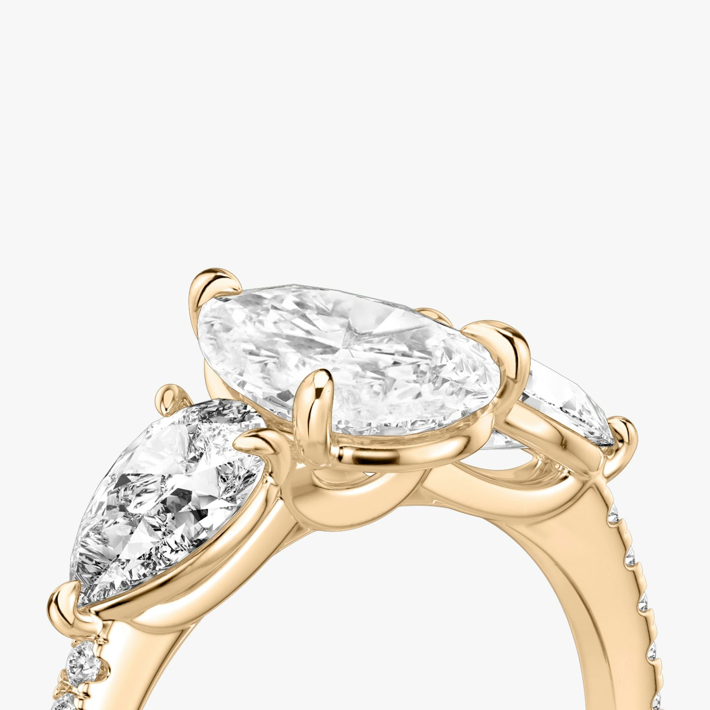 The Three Stone | Pear | 14k | Rose Gold | bandAccent: Pavé | sideStoneCarat: 0.50ct | sideStoneShape: Pear | diamondOrientation: vertical | caratWeight: other