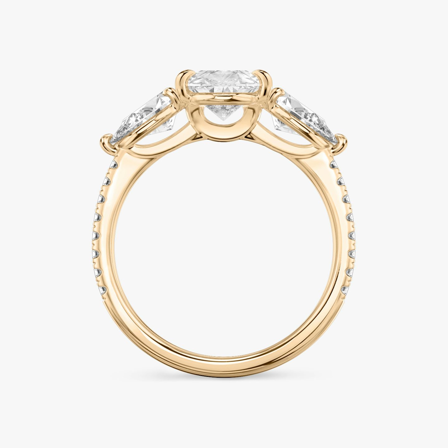 The Three Stone | Pear | 14k | Rose Gold | bandAccent: Pavé | sideStoneCarat: 0.50ct | sideStoneShape: Pear | diamondOrientation: vertical | caratWeight: other