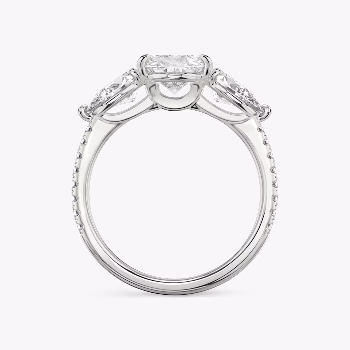 The Three Stone | Pear | Platinum | bandAccent: Pavé | sideStoneCarat: 0.50ct | sideStoneShape: Pear | diamondOrientation: vertical | caratWeight: other