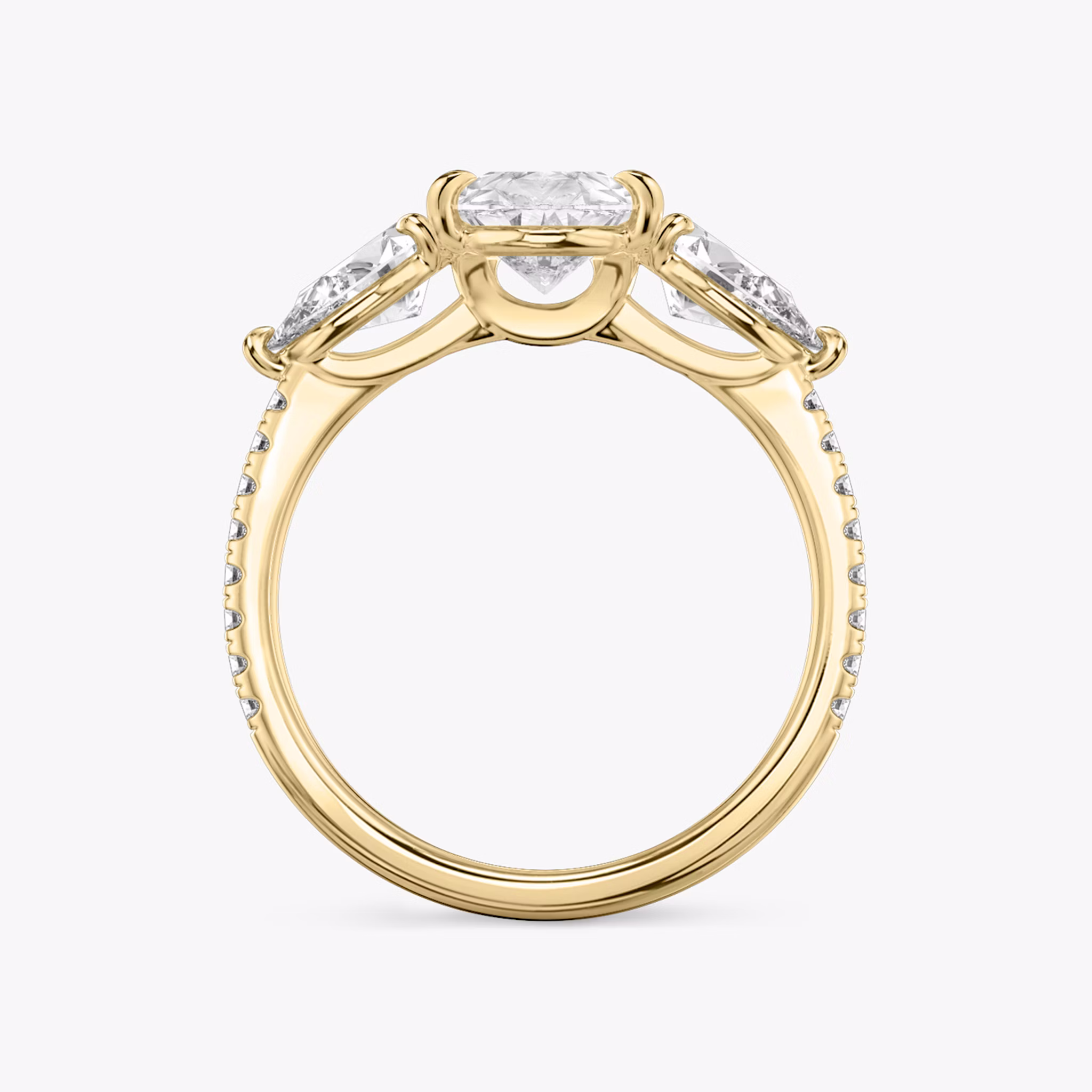 The Three Stone | Pear | 18k | Yellow Gold | bandAccent: Pavé | sideStoneCarat: 0.50ct | sideStoneShape: Pear | diamondOrientation: vertical | caratWeight: other