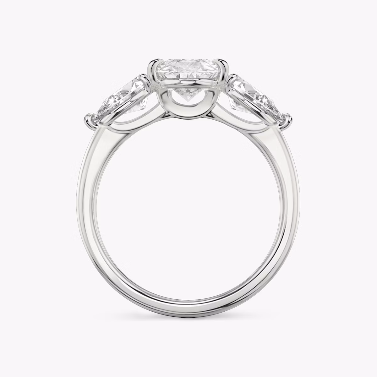 The Three Stone | Pear | Platinum | bandAccent: Plain | sideStoneCarat: 0.50ct | sideStoneShape: Pear | diamondOrientation: vertical | caratWeight: other