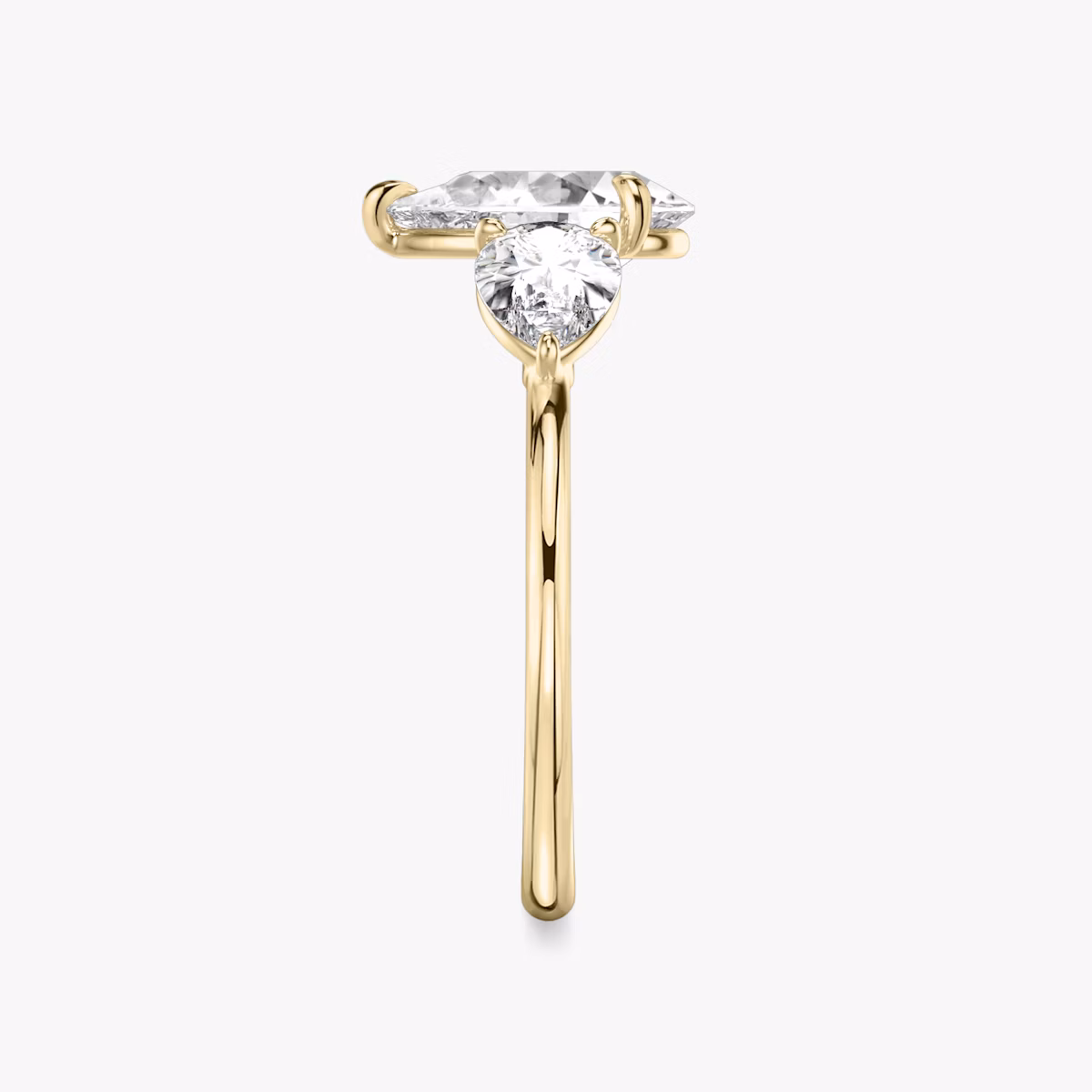 The Three Stone | Pear | 18k | Yellow Gold | bandAccent: Plain | sideStoneCarat: 0.50ct | sideStoneShape: Pear | diamondOrientation: vertical | caratWeight: other