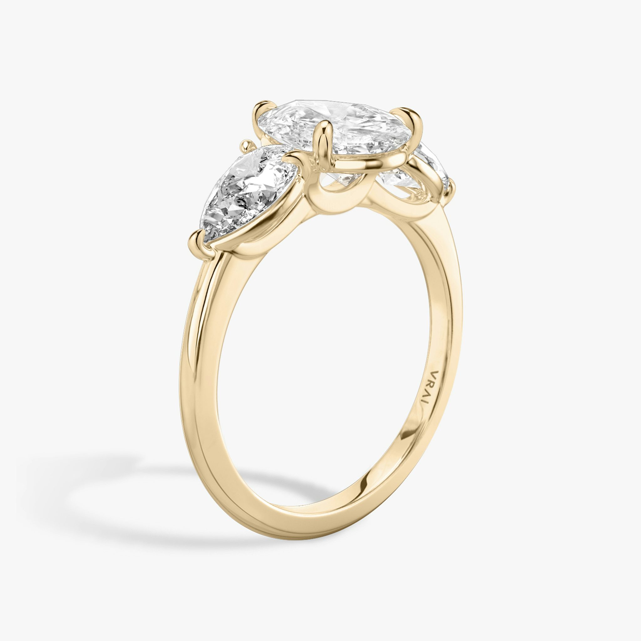 The Three Stone | Pear | 14k | Rose Gold | bandAccent: Plain | sideStoneCarat: 0.50ct | sideStoneShape: Pear | diamondOrientation: vertical | caratWeight: other