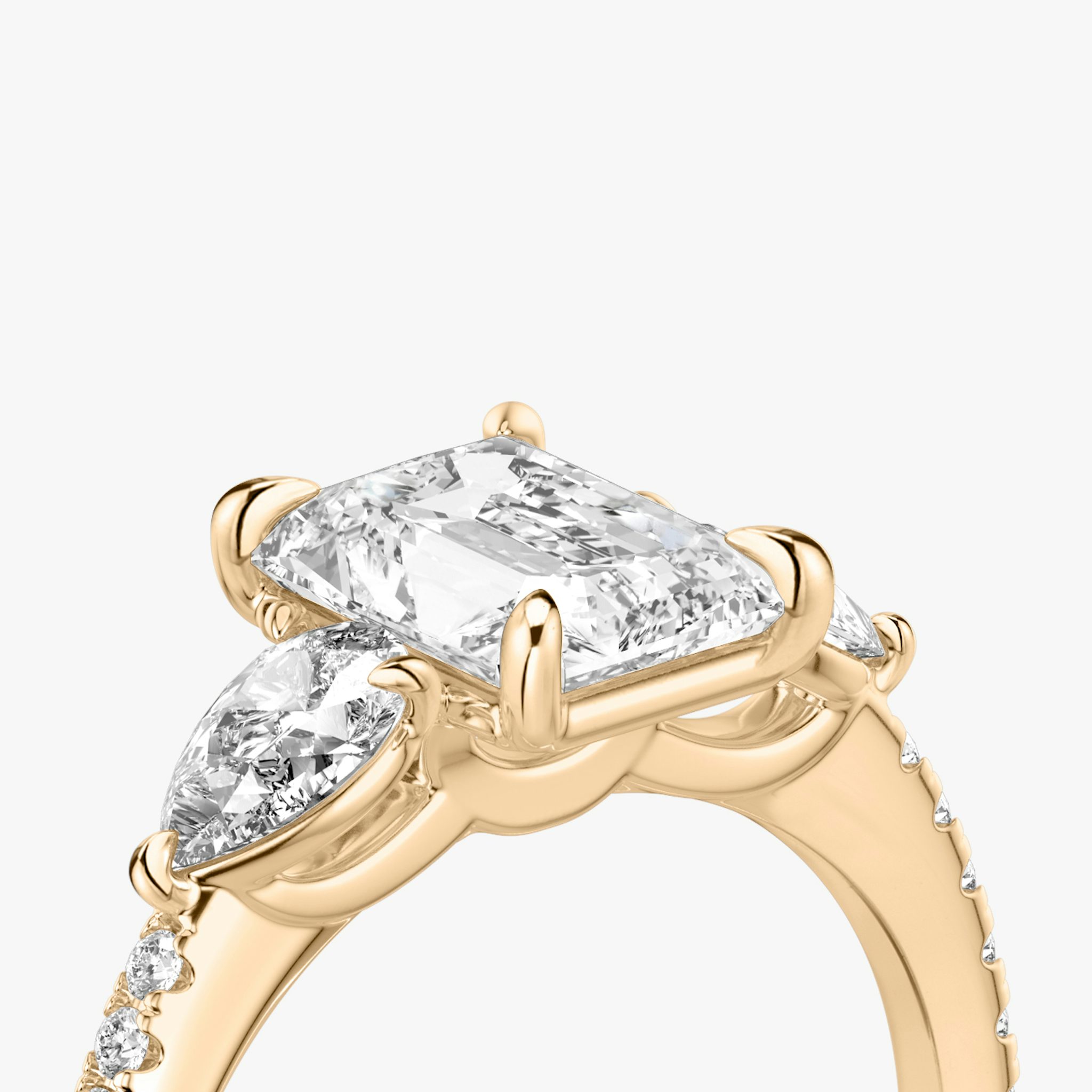 The Three Stone | Radiant | 14k | Rose Gold | bandAccent: Pavé | sideStoneCarat: 0.25ct | sideStoneShape: Pear | diamondOrientation: vertical | caratWeight: other