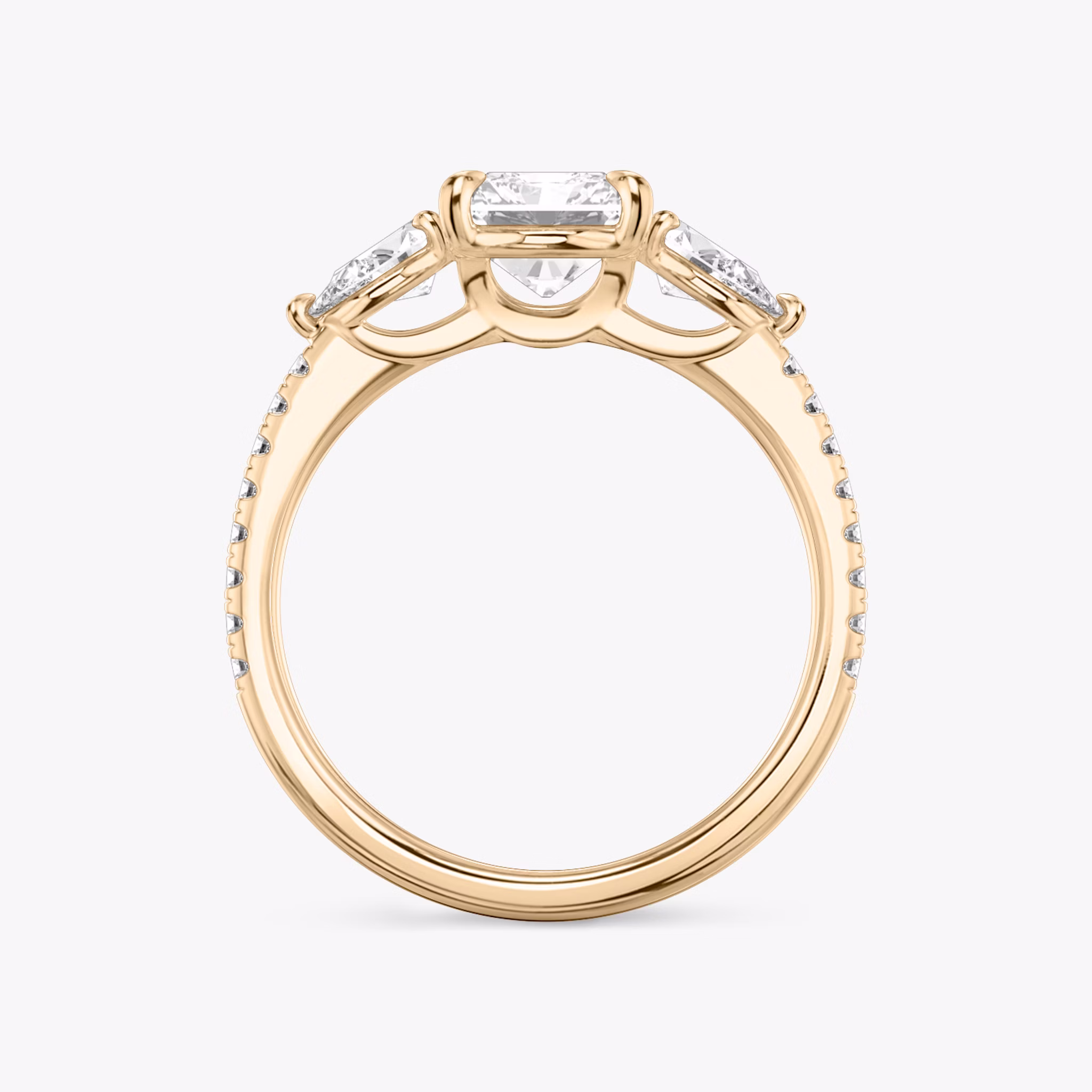 The Three Stone | Radiant | 14k | Rose Gold | bandAccent: Pavé | sideStoneCarat: 0.25ct | sideStoneShape: Pear | diamondOrientation: vertical | caratWeight: other