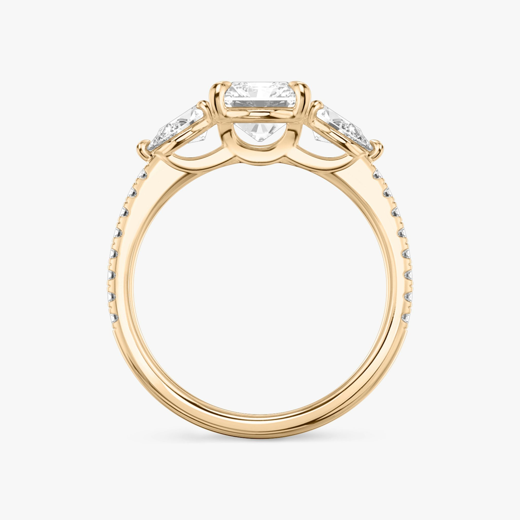 The Three Stone | Radiant | 14k | Rose Gold | bandAccent: Pavé | sideStoneCarat: 0.25ct | sideStoneShape: Pear | diamondOrientation: vertical | caratWeight: other
