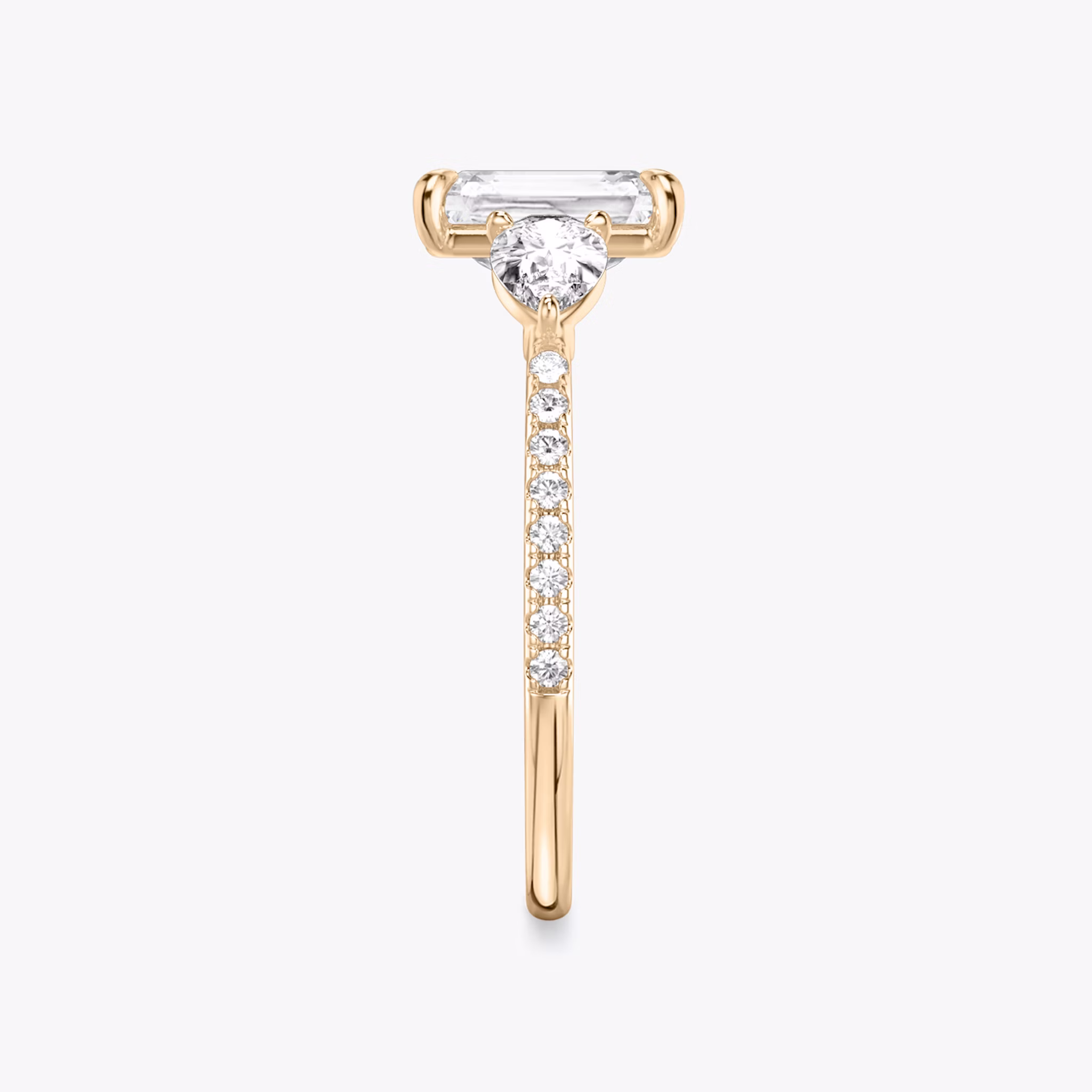 The Three Stone | Radiant | 14k | Rose Gold | bandAccent: Pavé | sideStoneCarat: 0.25ct | sideStoneShape: Pear | diamondOrientation: vertical | caratWeight: other