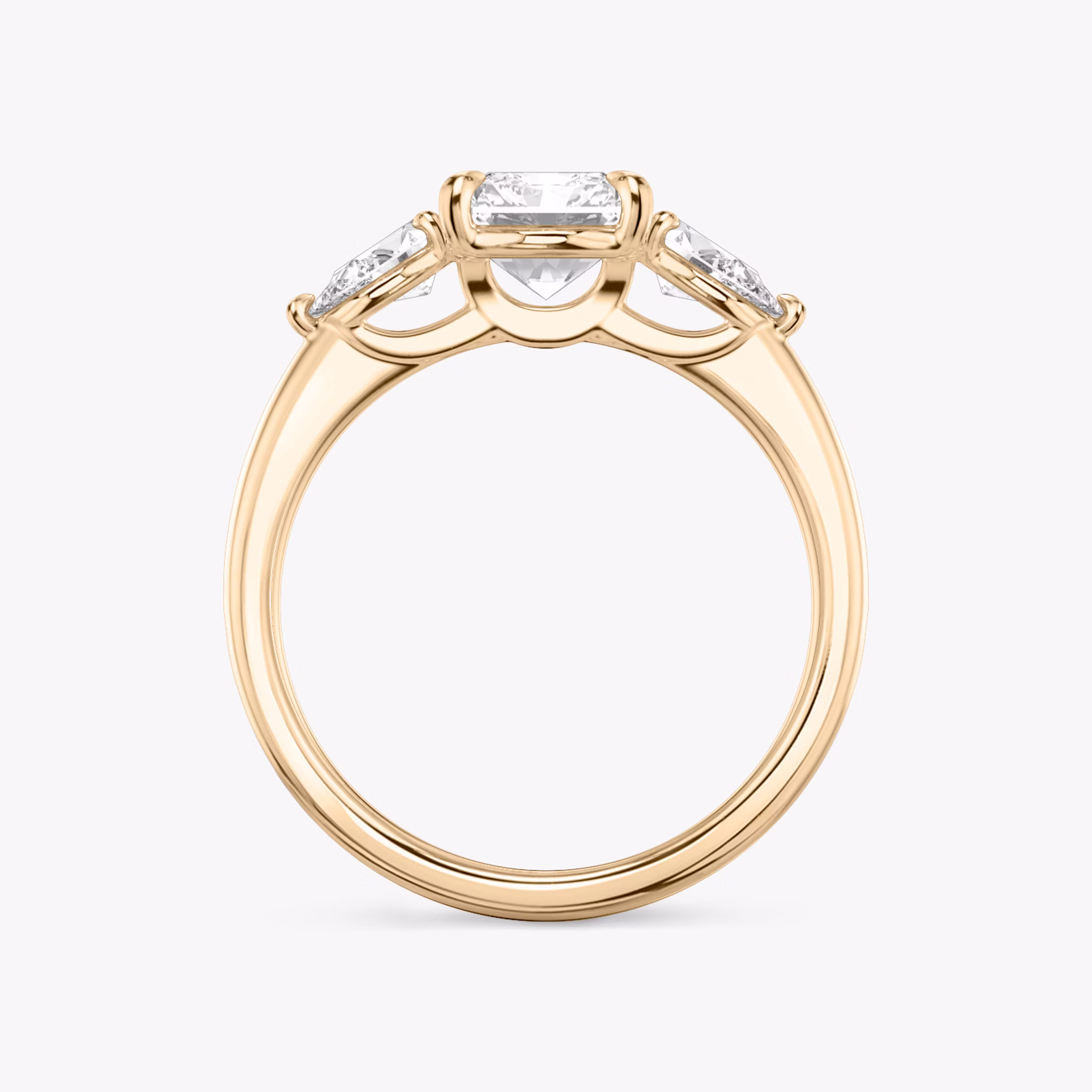 The Three Stone | Radiant | 14k | Rose Gold | bandAccent: Plain | sideStoneCarat: 0.25ct | sideStoneShape: Pear | diamondOrientation: vertical | caratWeight: other