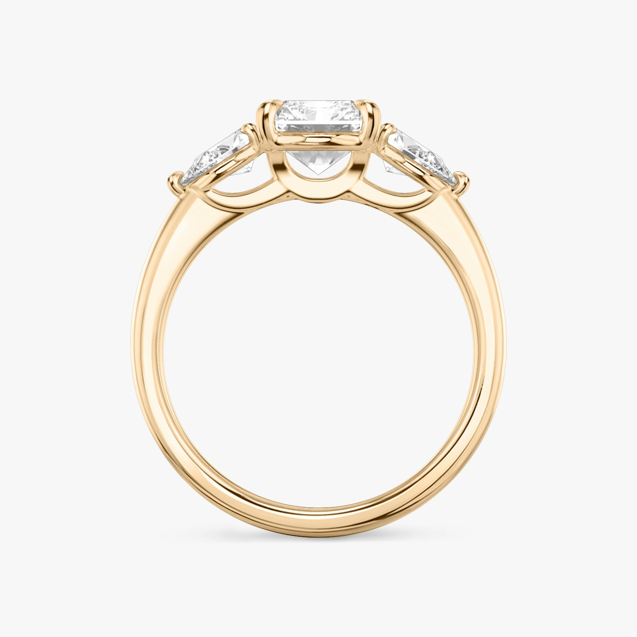 The Three Stone | Radiant | 14k | Rose Gold | bandAccent: Plain | sideStoneCarat: 0.25ct | sideStoneShape: Pear | diamondOrientation: vertical | caratWeight: other