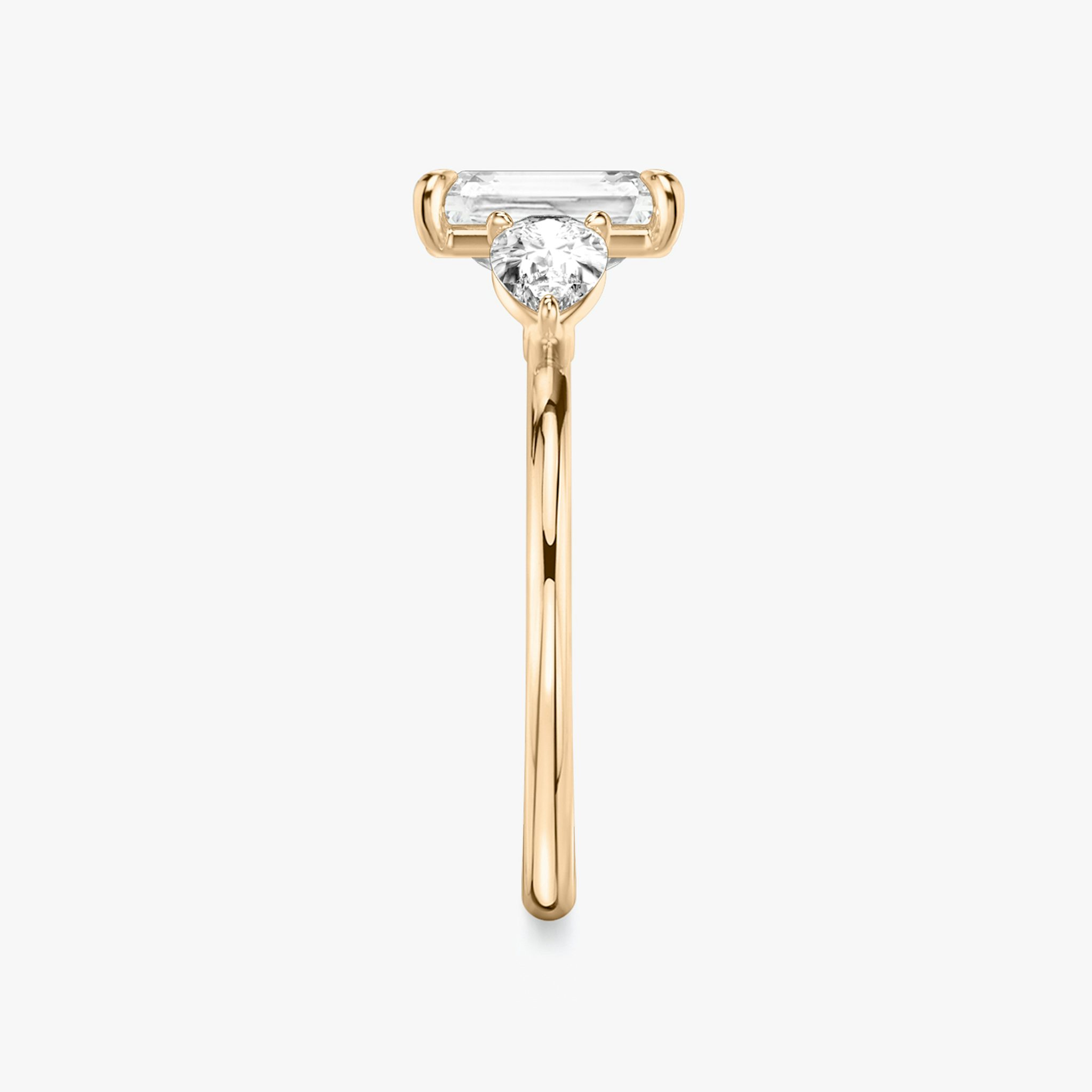 The Three Stone | Radiant | 14k | Rose Gold | bandAccent: Plain | sideStoneCarat: 0.25ct | sideStoneShape: Pear | diamondOrientation: vertical | caratWeight: other