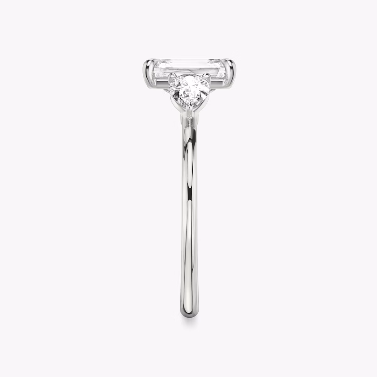 The Three Stone | Radiant | Platinum | bandAccent: Plain | sideStoneCarat: 0.25ct | sideStoneShape: Pear | diamondOrientation: vertical | caratWeight: other