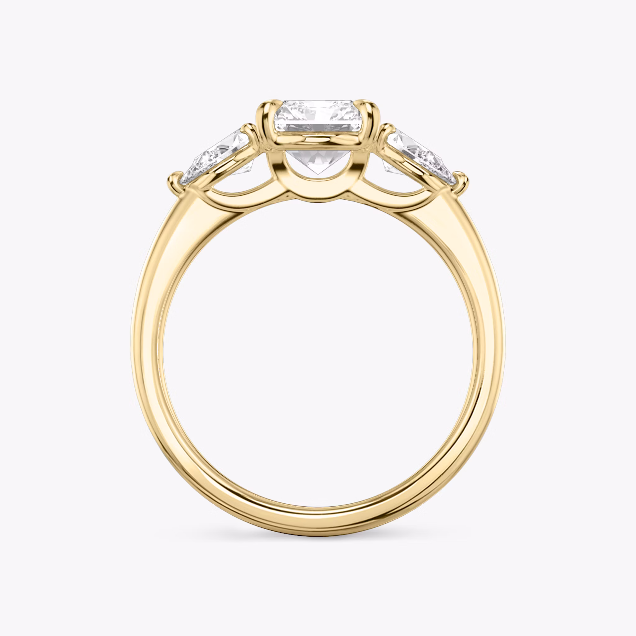 The Three Stone | Radiant | 18k | Yellow Gold | bandAccent: Plain | sideStoneCarat: 0.25ct | sideStoneShape: Pear | diamondOrientation: vertical | caratWeight: other