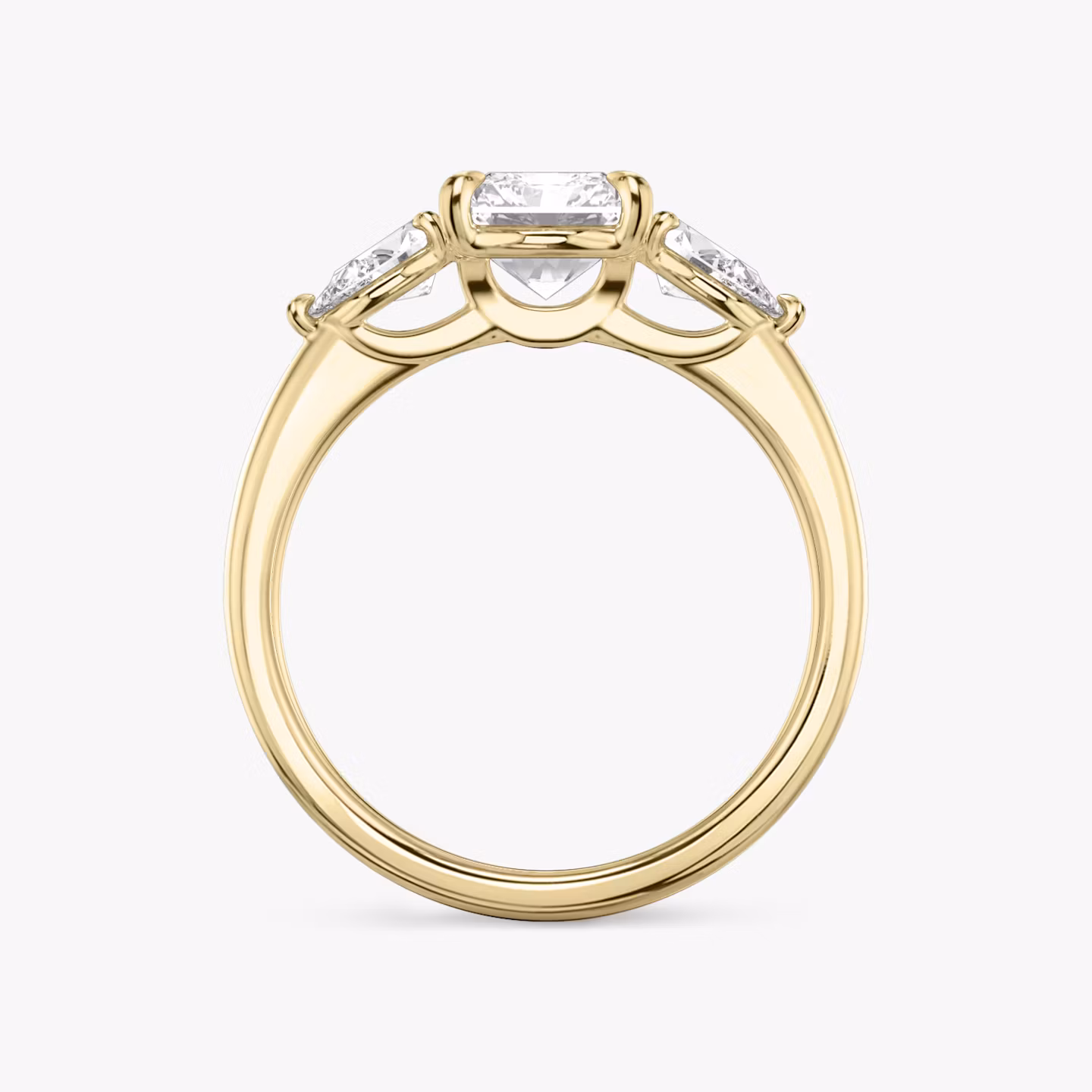 The Three Stone | Radiant | 18k | Yellow Gold | bandAccent: Plain | sideStoneCarat: 0.25ct | sideStoneShape: Pear | diamondOrientation: vertical | caratWeight: other