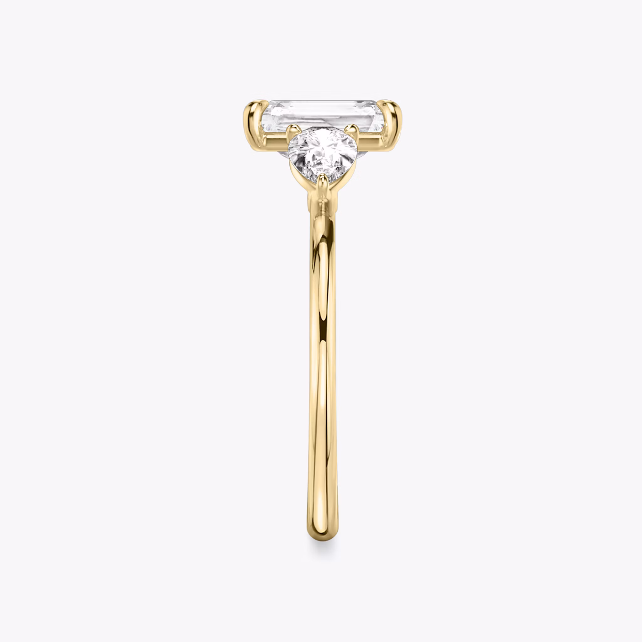 The Three Stone | Radiant | 18k | Yellow Gold | bandAccent: Plain | sideStoneCarat: 0.25ct | sideStoneShape: Pear | diamondOrientation: vertical | caratWeight: other