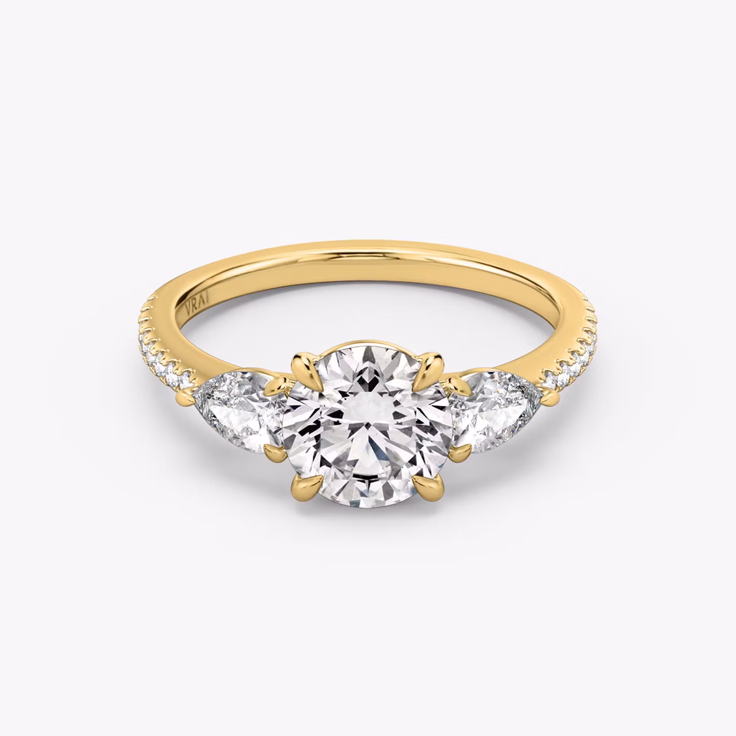 The Three Stone Round Brilliant | Yellow Gold