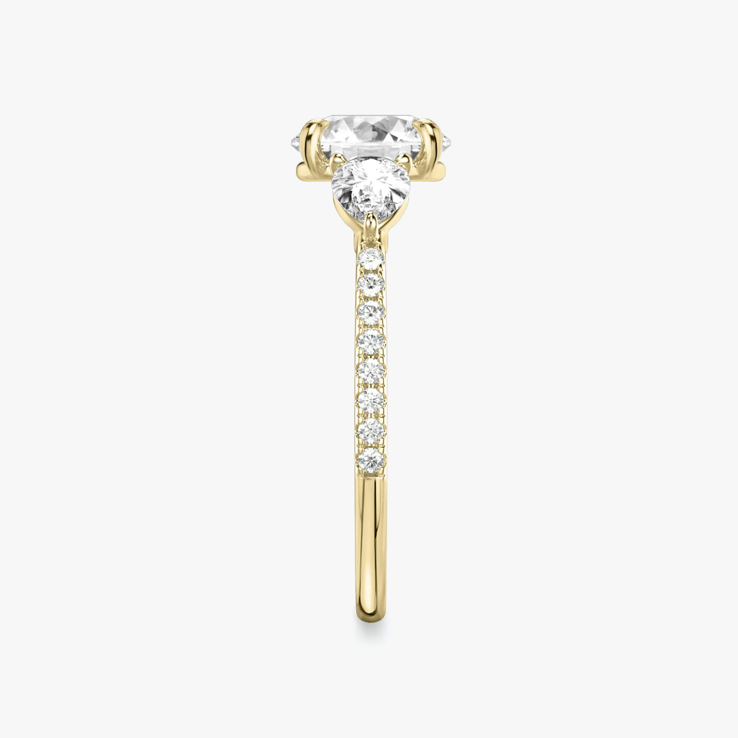 The Three Stone | Round Brilliant | 18k | Yellow Gold | bandAccent: Pavé | caratWeight: other | sideStoneCarat: 0.25ct | sideStoneShape: Pear | diamondOrientation: vertical