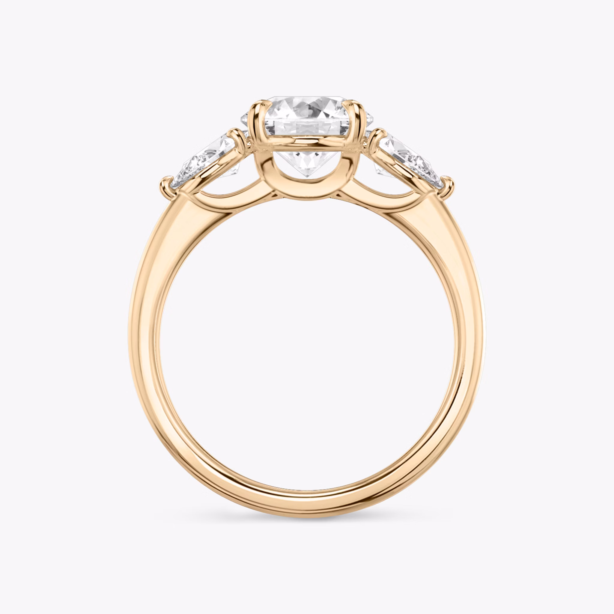 The Three Stone | Round Brilliant | 14k | Rose Gold | bandAccent: Plain | caratWeight: other | sideStoneCarat: 0.25ct | sideStoneShape: Pear | diamondOrientation: vertical