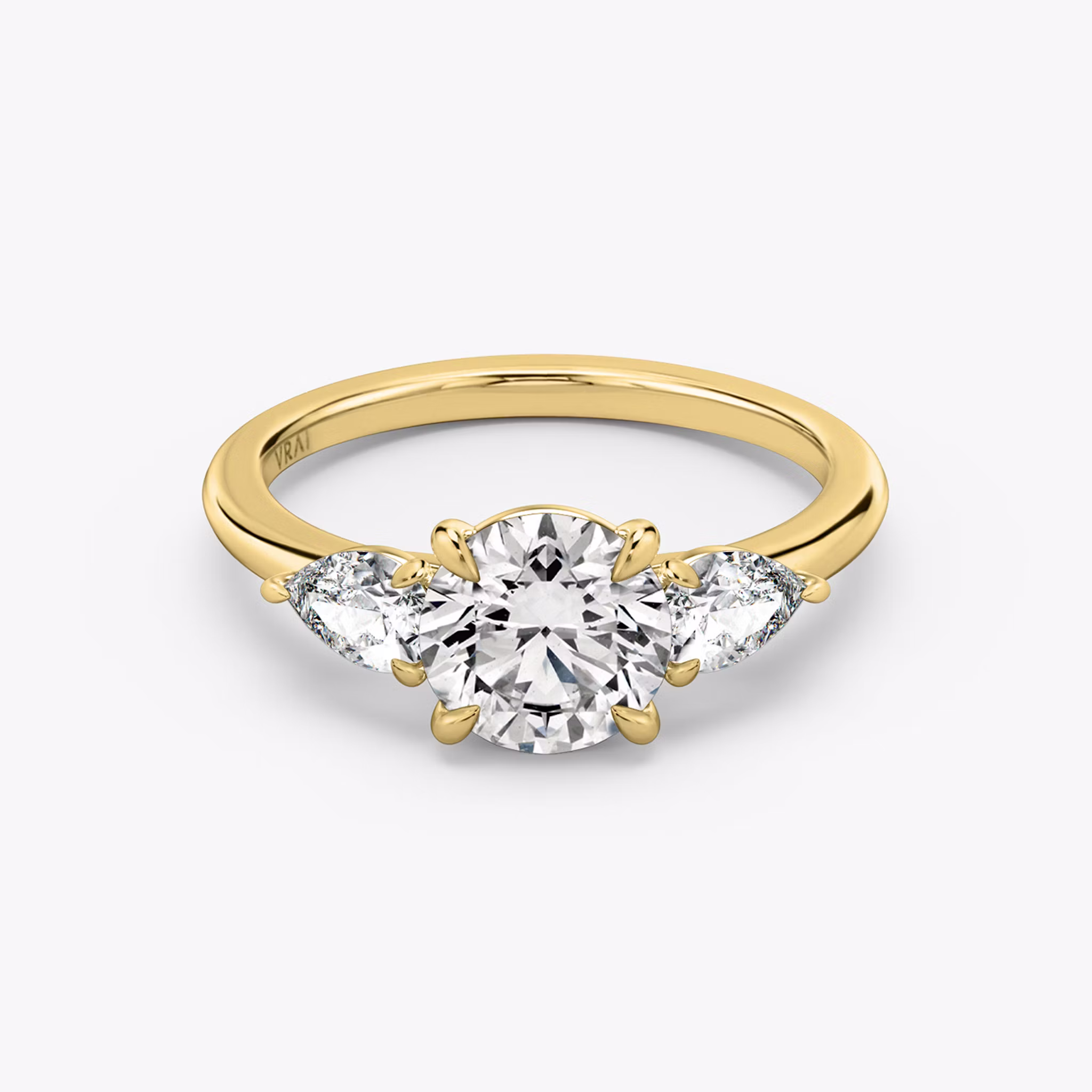 The Three Stone Round Brilliant | Yellow Gold