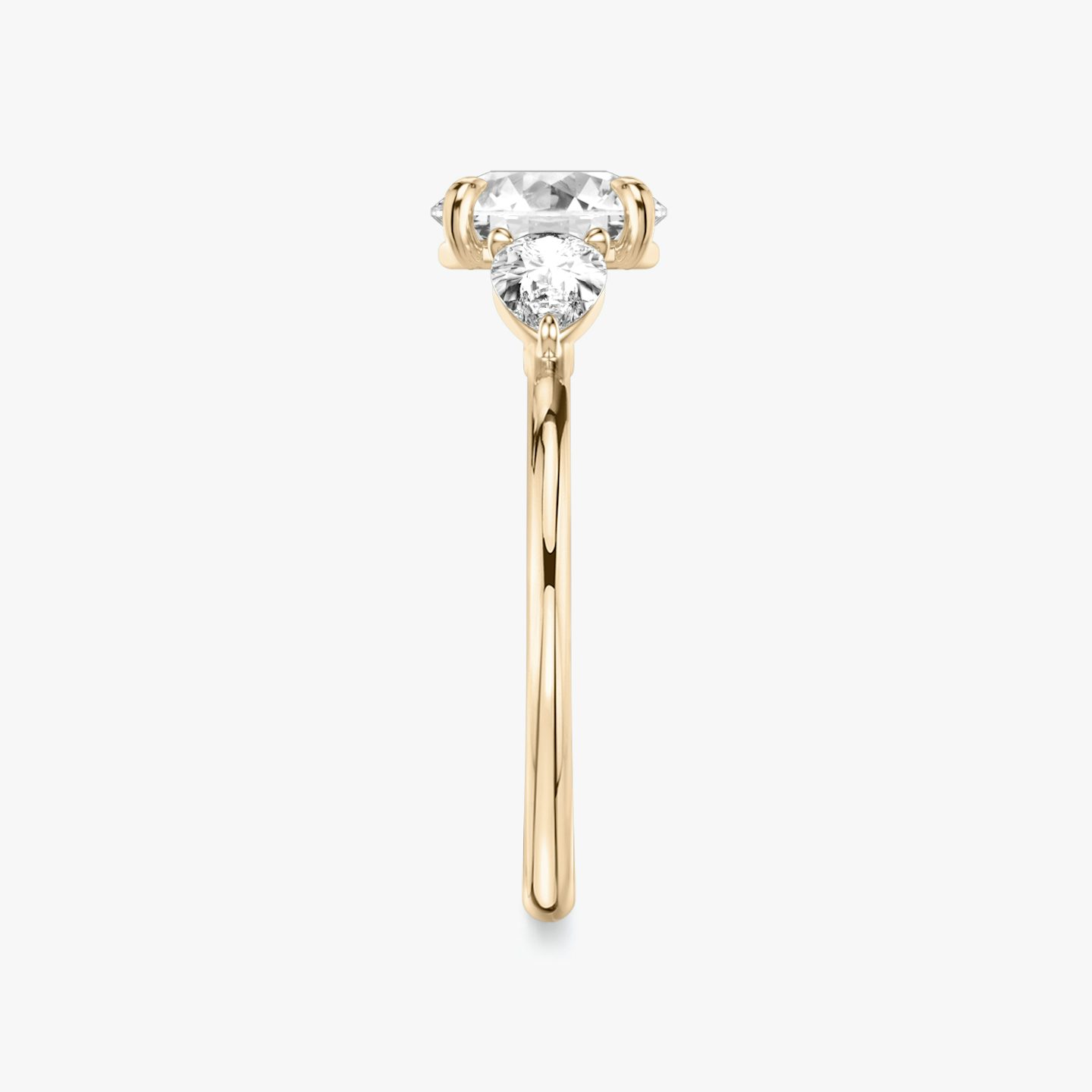 The Three Stone | Round Brilliant | 14k | Rose Gold | bandAccent: Plain | caratWeight: other | sideStoneCarat: 0.25ct | sideStoneShape: Pear | diamondOrientation: vertical
