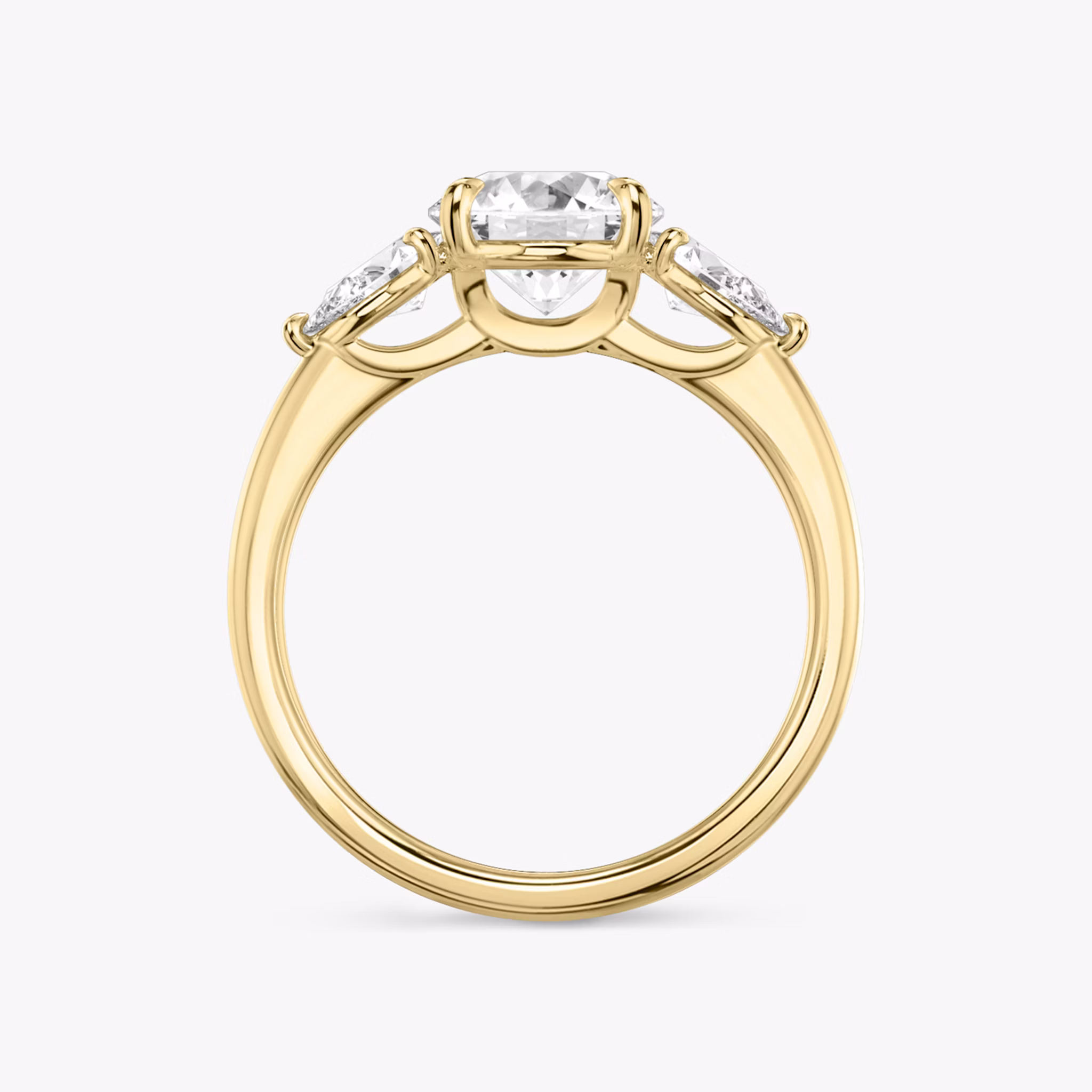 The Three Stone | Round Brilliant | 18k | Yellow Gold | bandAccent: Plain | caratWeight: other | sideStoneCarat: 0.25ct | sideStoneShape: Pear | diamondOrientation: vertical