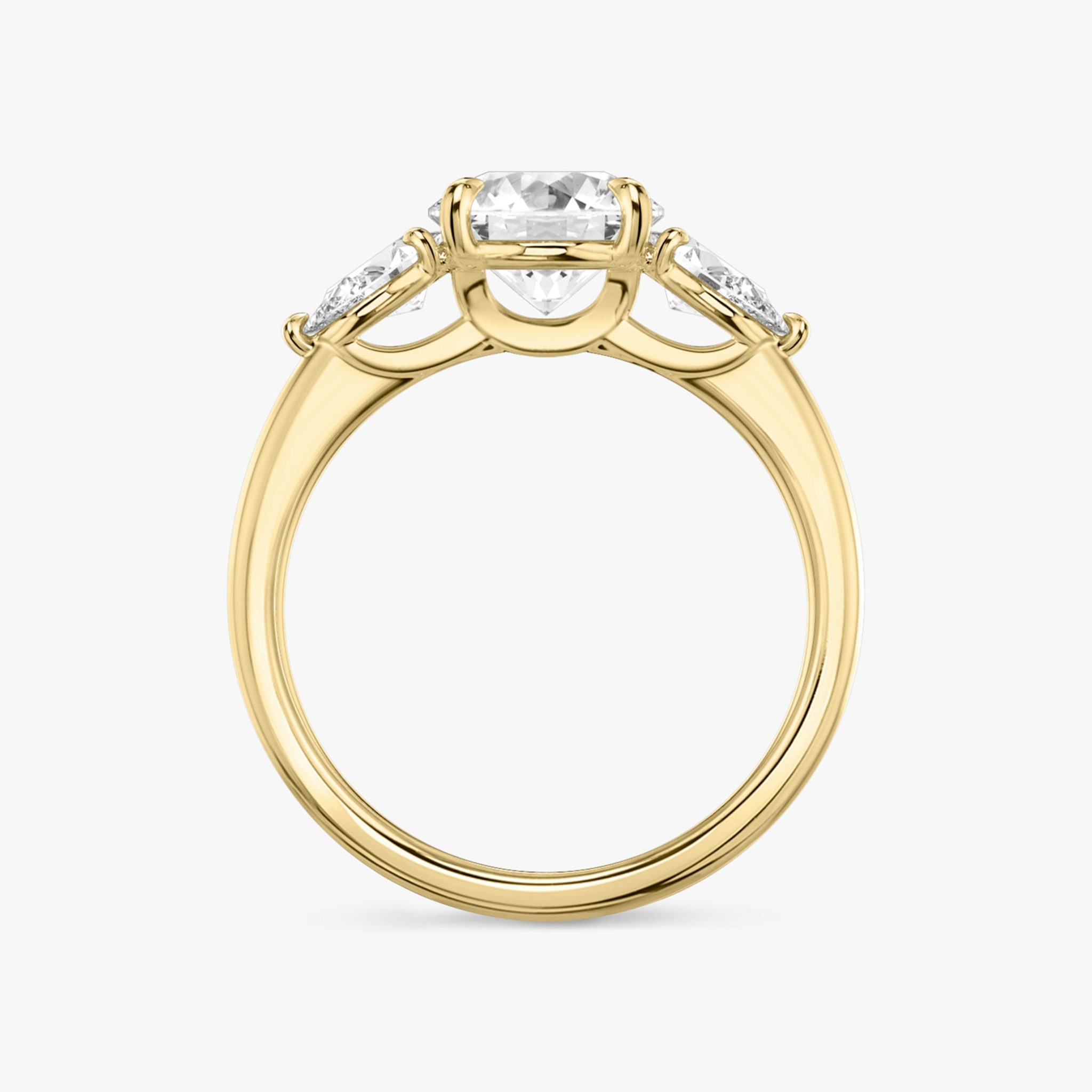 The Three Stone | Round Brilliant | 18k | Yellow Gold | bandAccent: Plain | caratWeight: other | sideStoneCarat: 0.25ct | sideStoneShape: Pear | diamondOrientation: vertical