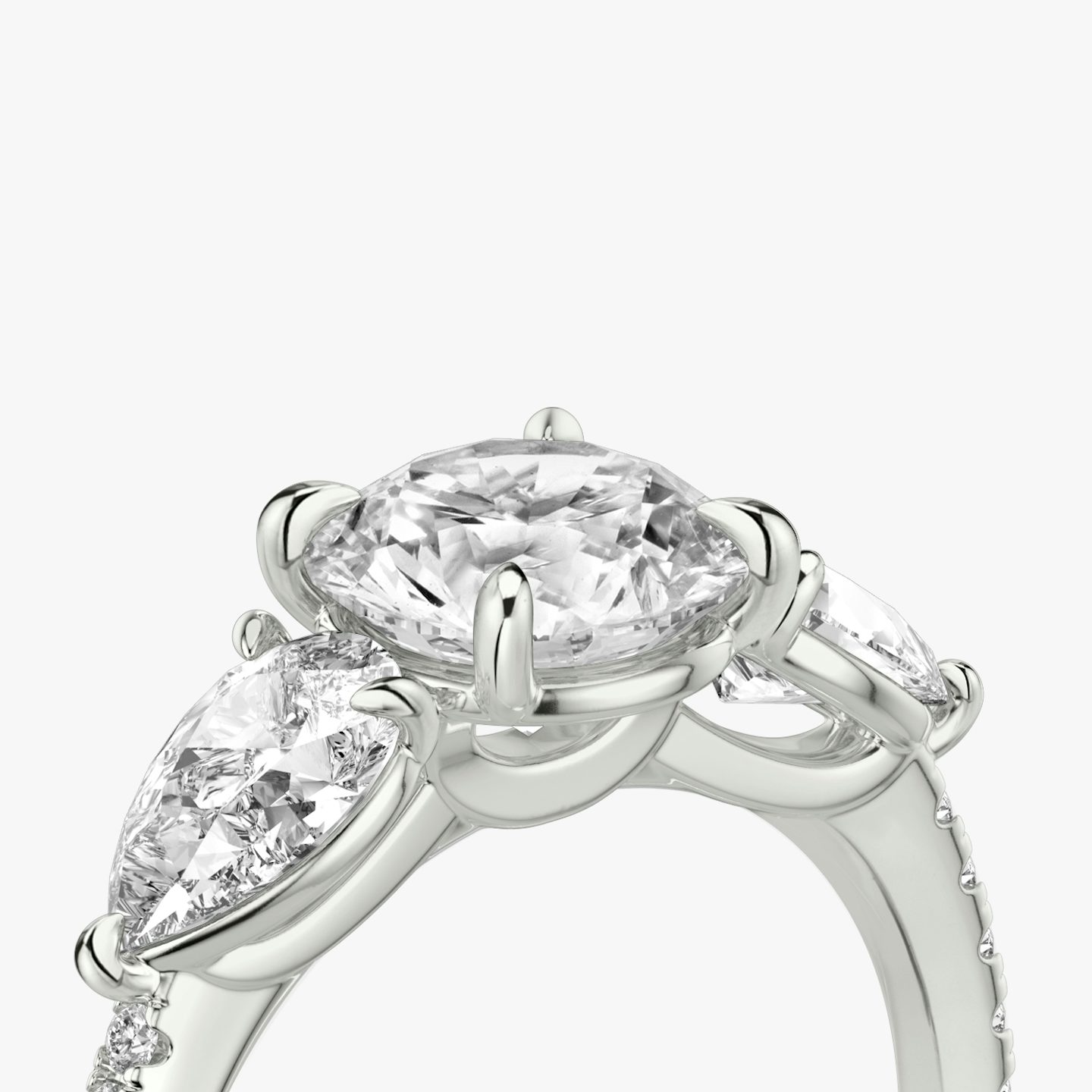 The Three Stone | Round Brilliant | 18k | White Gold | bandAccent: Pavé | caratWeight: other | sideStoneCarat: 0.50ct | sideStoneShape: Pear | diamondOrientation: vertical