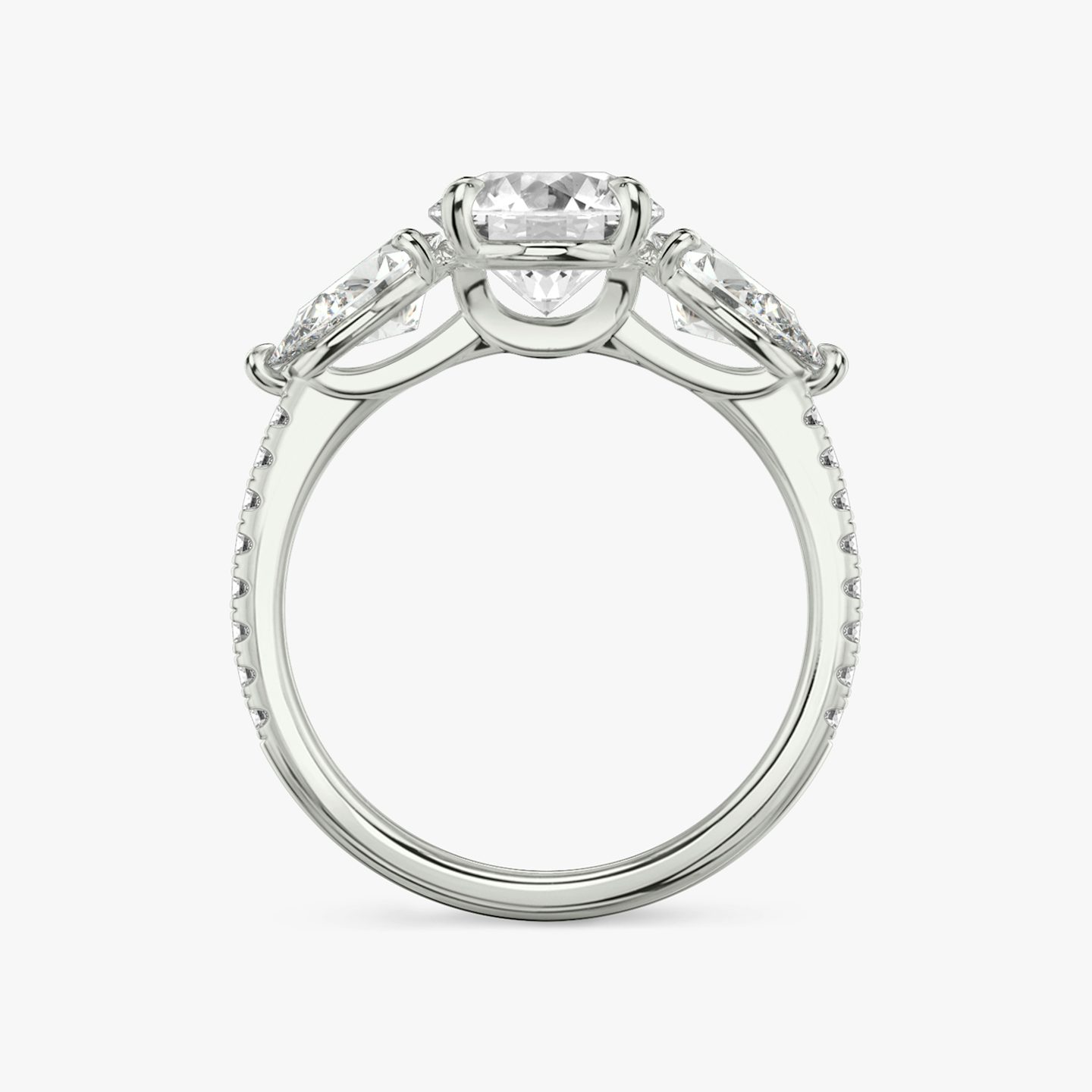 The Three Stone | Round Brilliant | 18k | White Gold | bandAccent: Pavé | caratWeight: other | sideStoneCarat: 0.50ct | sideStoneShape: Pear | diamondOrientation: vertical