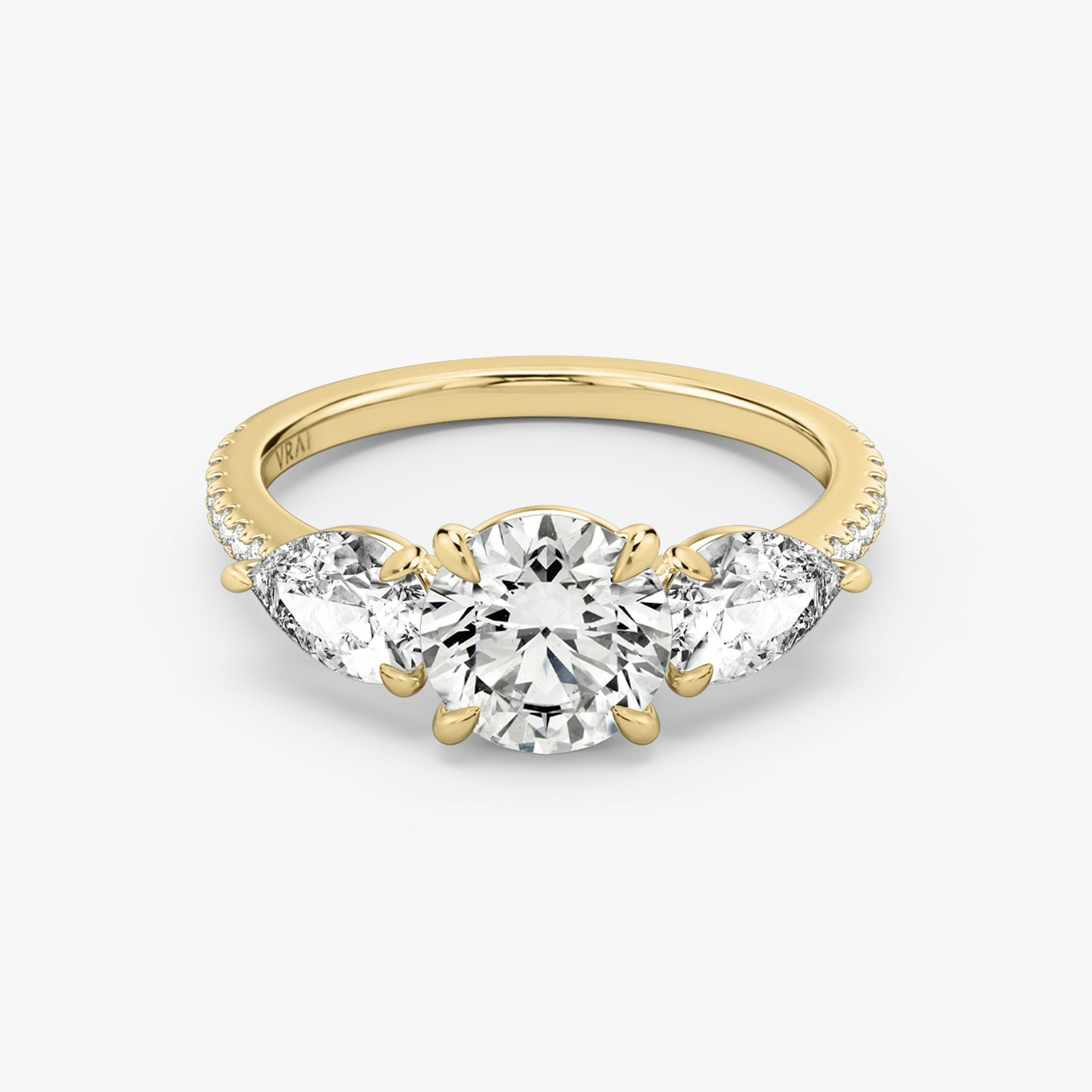 The Three Stone | Round Brilliant | 18k | Yellow Gold | bandAccent: Pavé | caratWeight: other | sideStoneCarat: 0.50ct | sideStoneShape: Pear | diamondOrientation: vertical