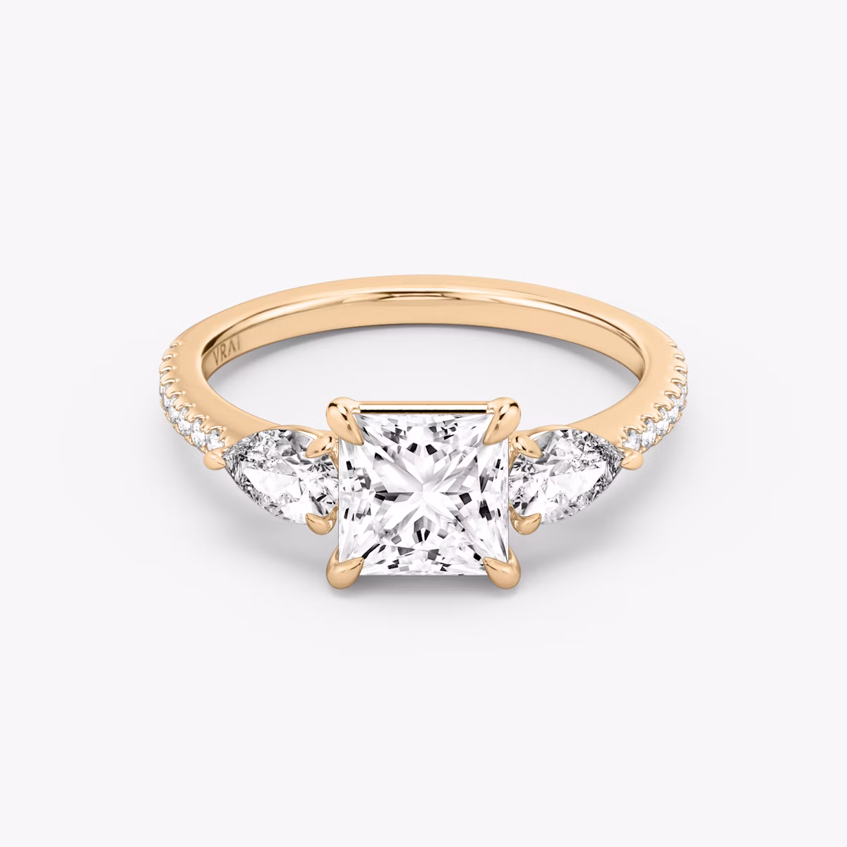The Three Stone | Princess | 14k | Rose Gold | bandAccent: Pavé | sideStoneCarat: 0.25ct | sideStoneShape: Pear | diamondOrientation: vertical | caratWeight: other