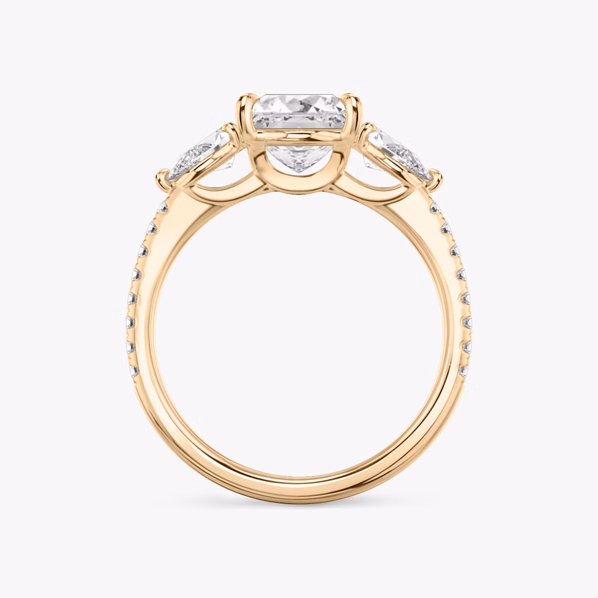 The Three Stone | Princess | 14k | Rose Gold | bandAccent: Pavé | sideStoneCarat: 0.25ct | sideStoneShape: Pear | diamondOrientation: vertical | caratWeight: other