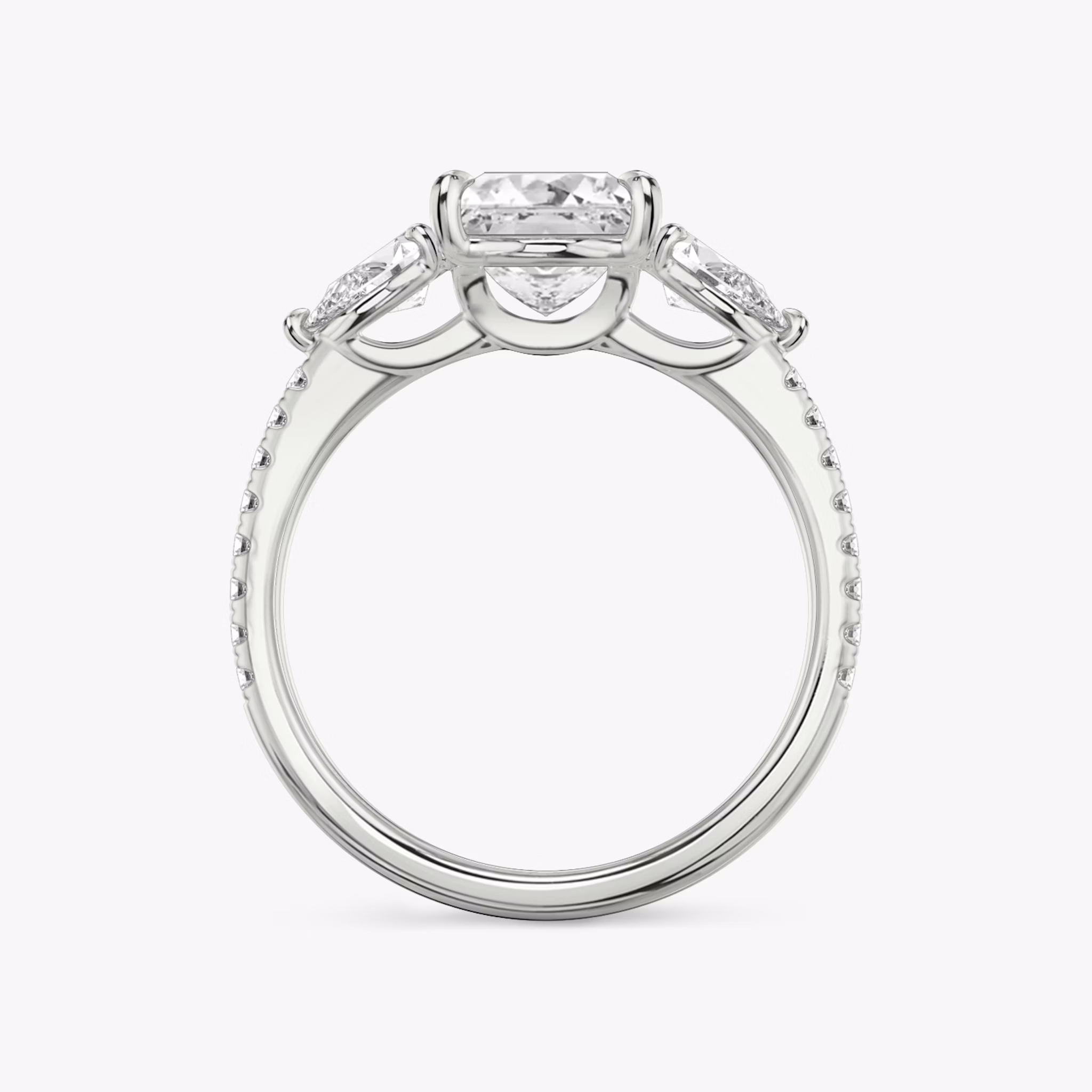 The Three Stone | Princess | 18k | White Gold | bandAccent: Pavé | sideStoneCarat: 0.25ct | sideStoneShape: Pear | diamondOrientation: vertical | caratWeight: other