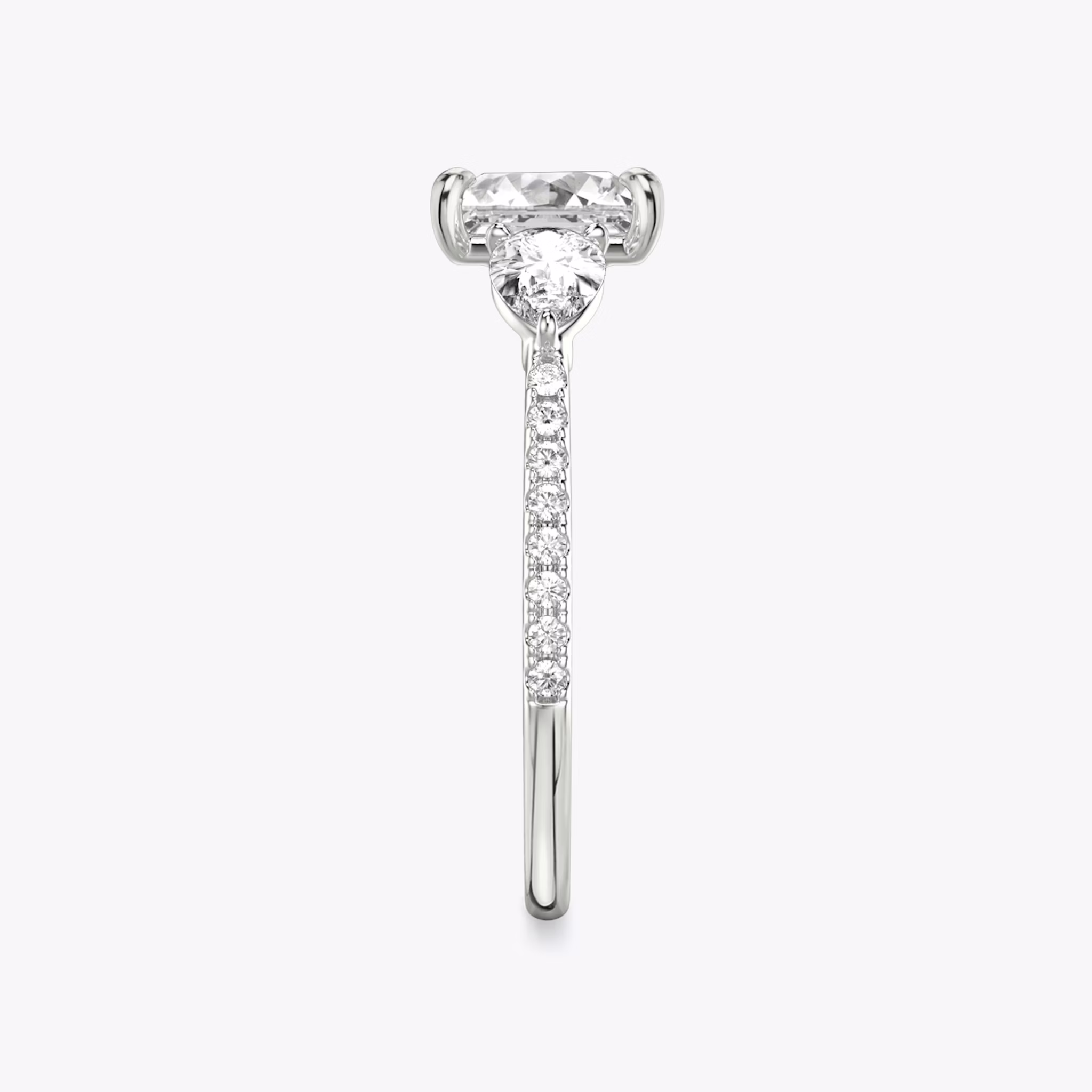 The Three Stone | Princess | 18k | White Gold | bandAccent: Pavé | sideStoneCarat: 0.25ct | sideStoneShape: Pear | diamondOrientation: vertical | caratWeight: other