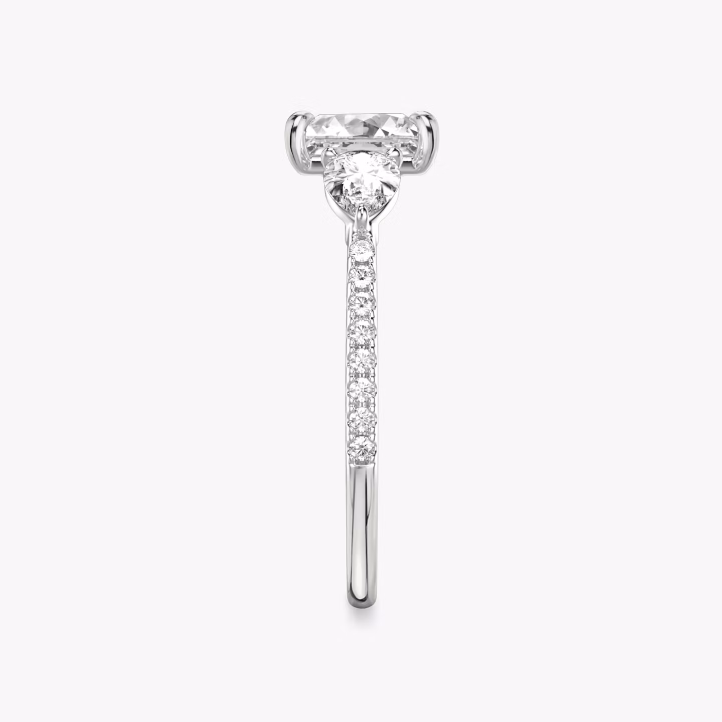 The Three Stone | Princess | 18k | White Gold | bandAccent: Pavé | sideStoneCarat: 0.25ct | sideStoneShape: Pear | diamondOrientation: vertical | caratWeight: other