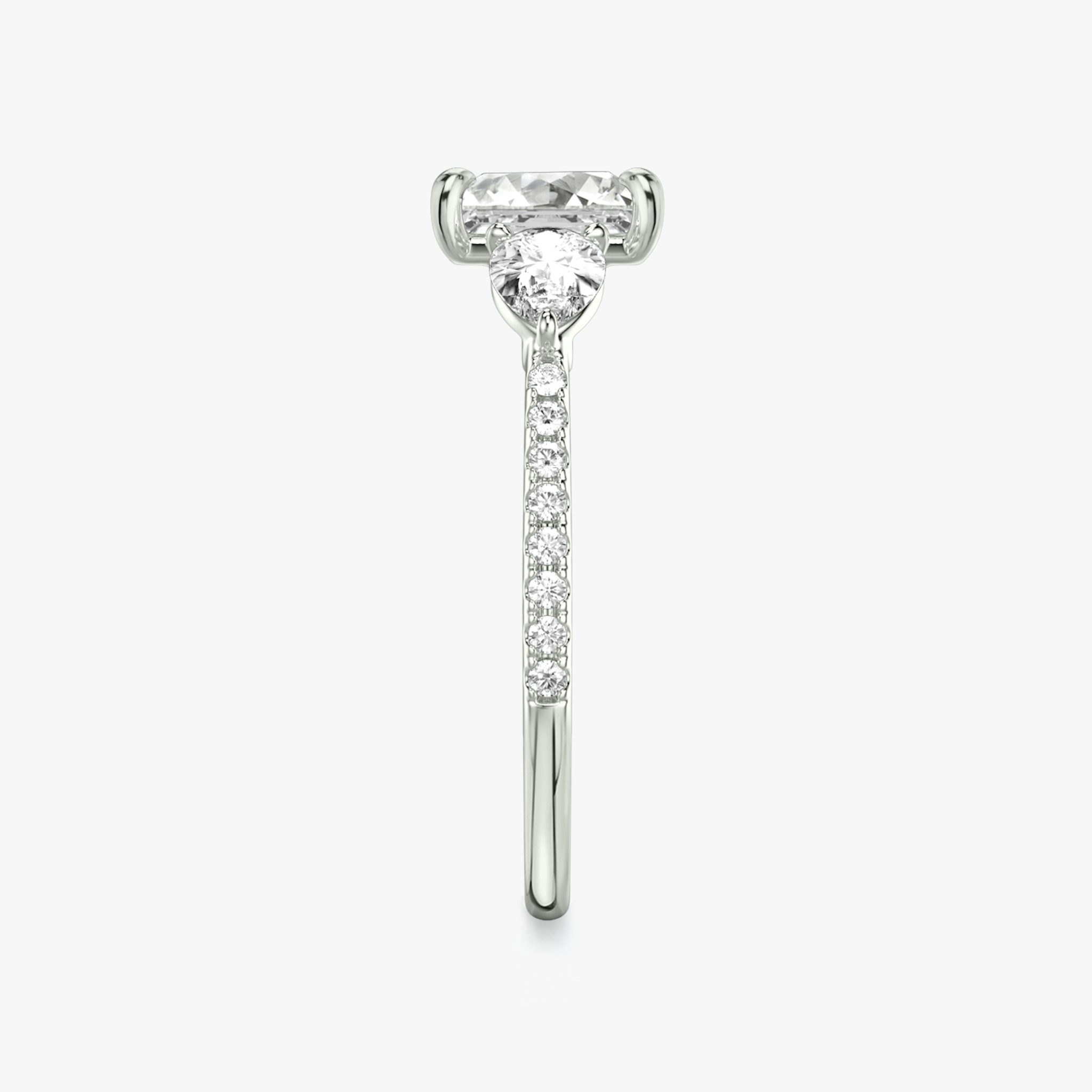 The Three Stone | Princess | 18k | White Gold | bandAccent: Pavé | sideStoneCarat: 0.25ct | sideStoneShape: Pear | diamondOrientation: vertical | caratWeight: other