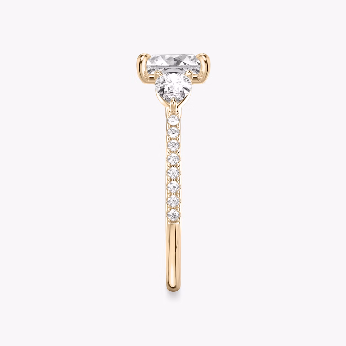The Three Stone | Princess | 14k | Rose Gold | bandAccent: Pavé | sideStoneCarat: 0.25ct | sideStoneShape: Pear | diamondOrientation: vertical | caratWeight: other