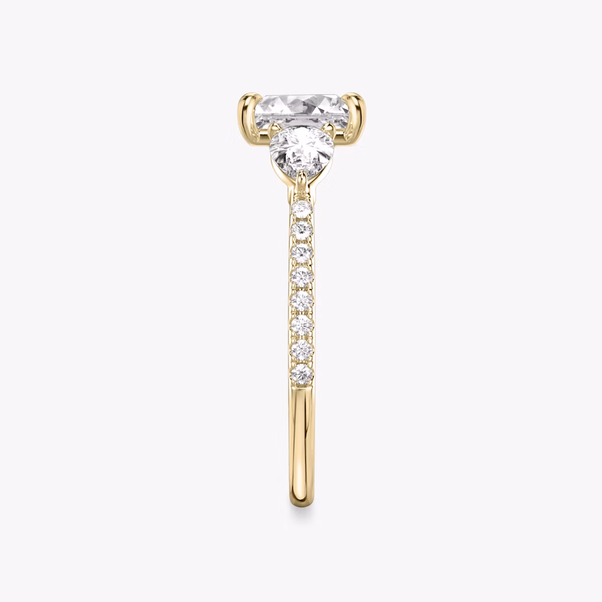 The Three Stone | Princess | 18k | Yellow Gold | bandAccent: Pavé | sideStoneCarat: 0.25ct | sideStoneShape: Pear | diamondOrientation: vertical | caratWeight: other