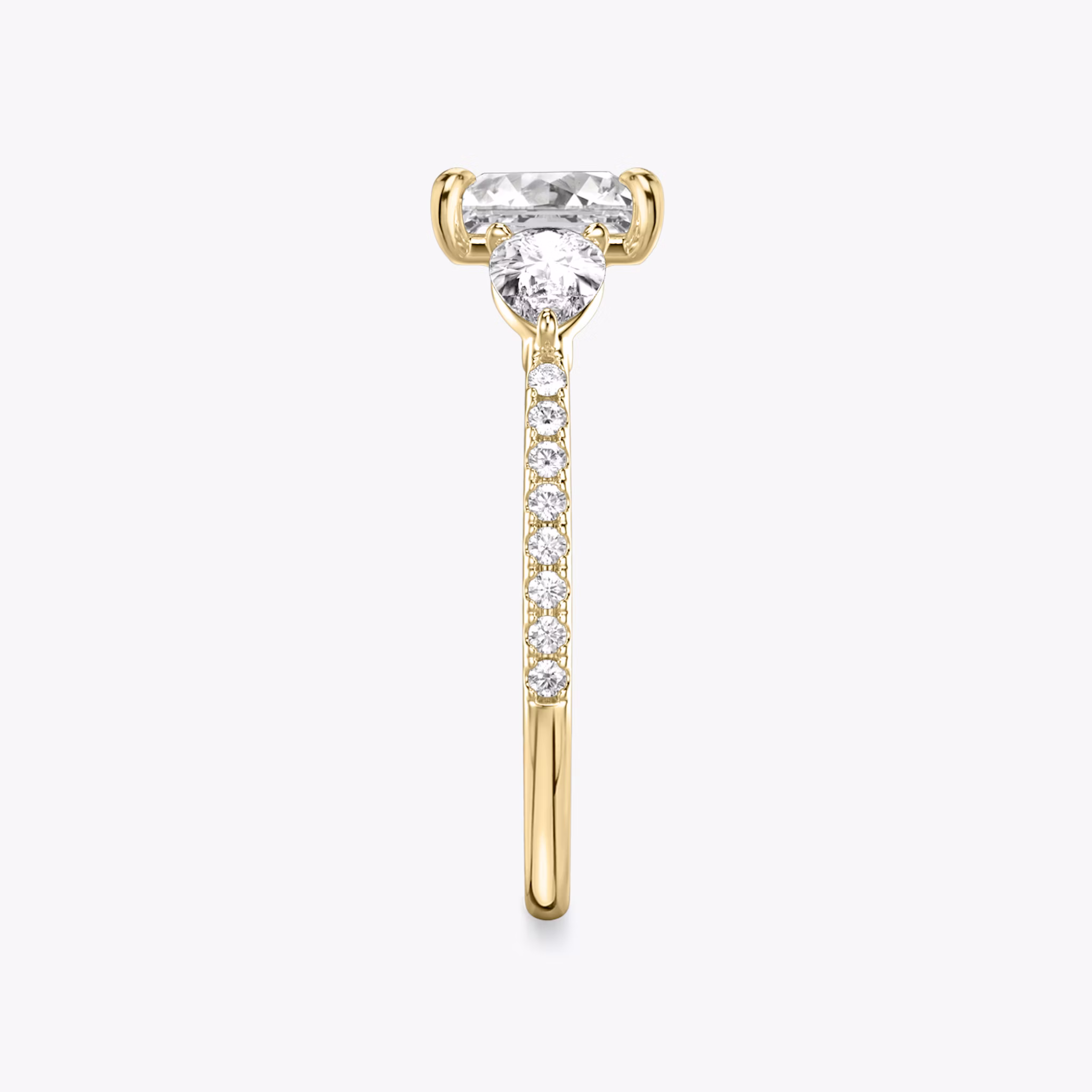 The Three Stone | Princess | 18k | Yellow Gold | bandAccent: Pavé | sideStoneCarat: 0.25ct | sideStoneShape: Pear | diamondOrientation: vertical | caratWeight: other