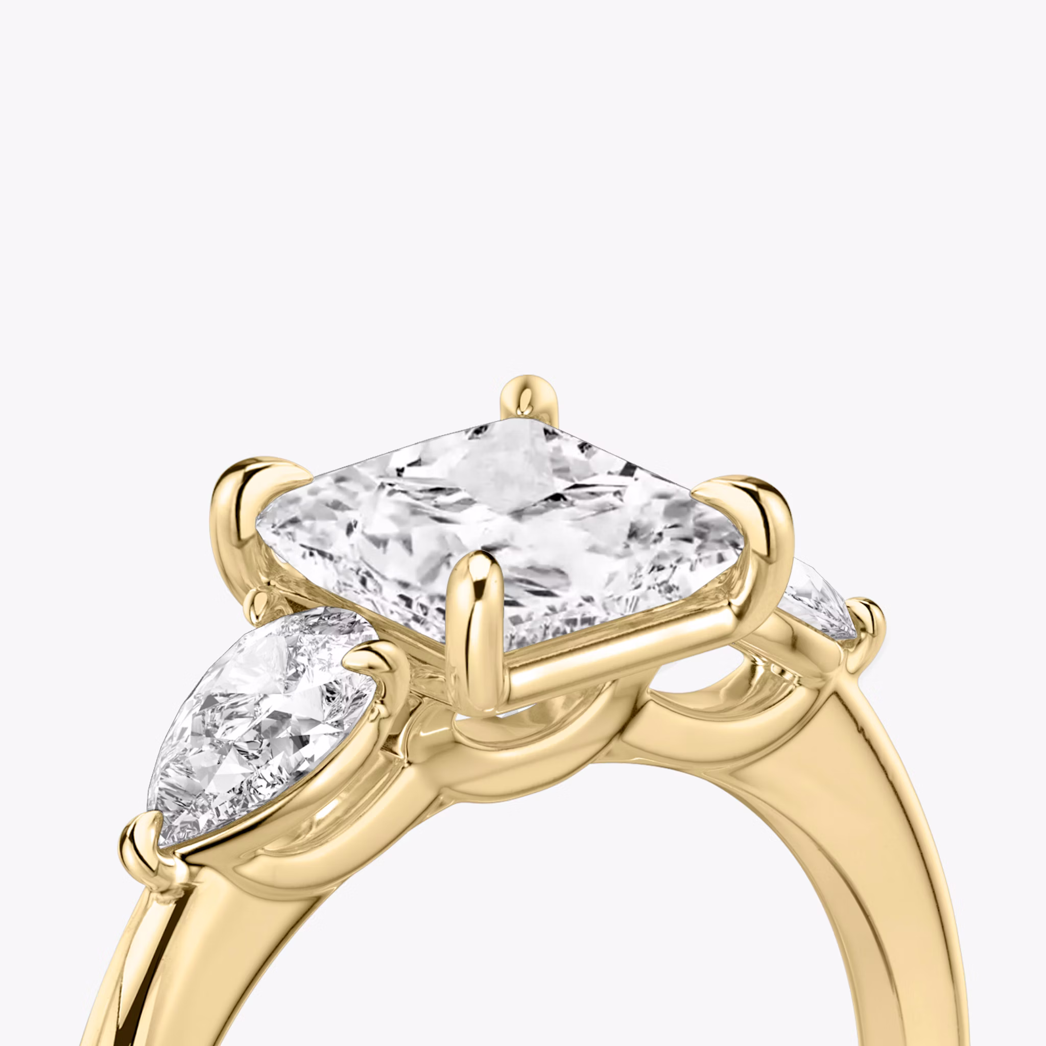 The Three Stone | Princess | 18k | Yellow Gold | bandAccent: Plain | sideStoneCarat: 0.25ct | sideStoneShape: Pear | diamondOrientation: vertical | caratWeight: other