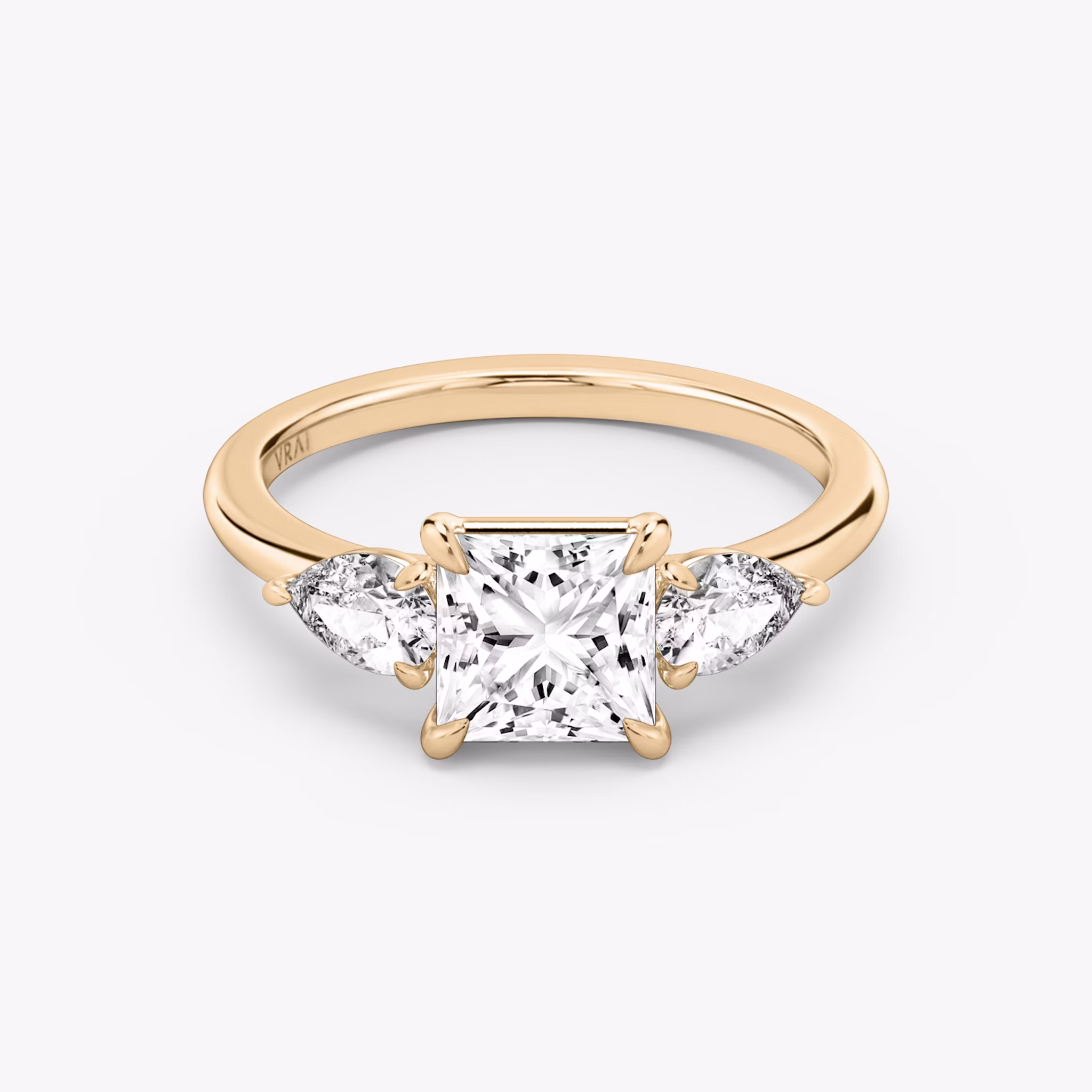 The Three Stone | Princess | 14k | Rose Gold | bandAccent: Plain | sideStoneCarat: 0.25ct | sideStoneShape: Pear | diamondOrientation: vertical | caratWeight: other