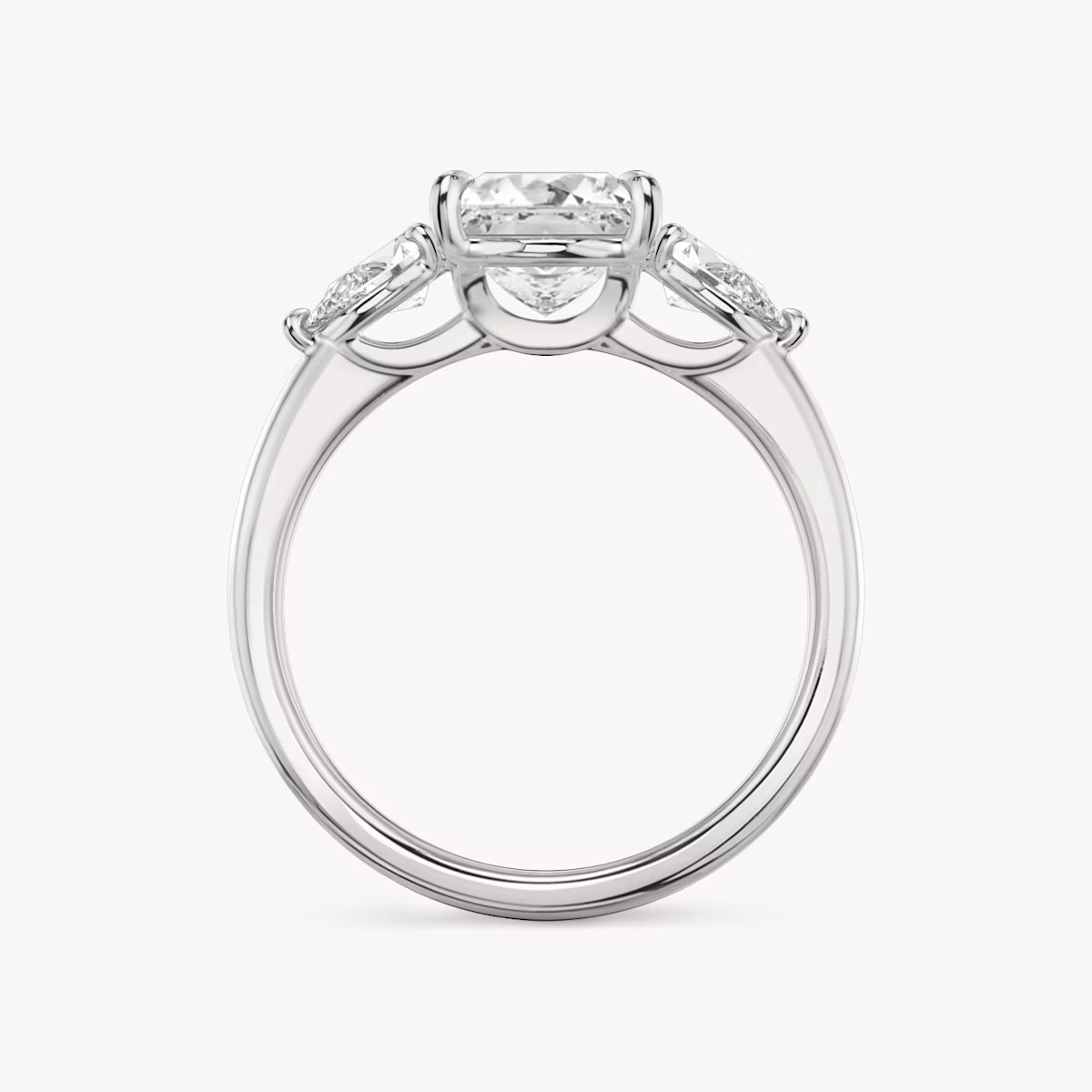The Three Stone | Princess | Platinum | bandAccent: Plain | sideStoneCarat: 0.25ct | sideStoneShape: Pear | diamondOrientation: vertical | caratWeight: other
